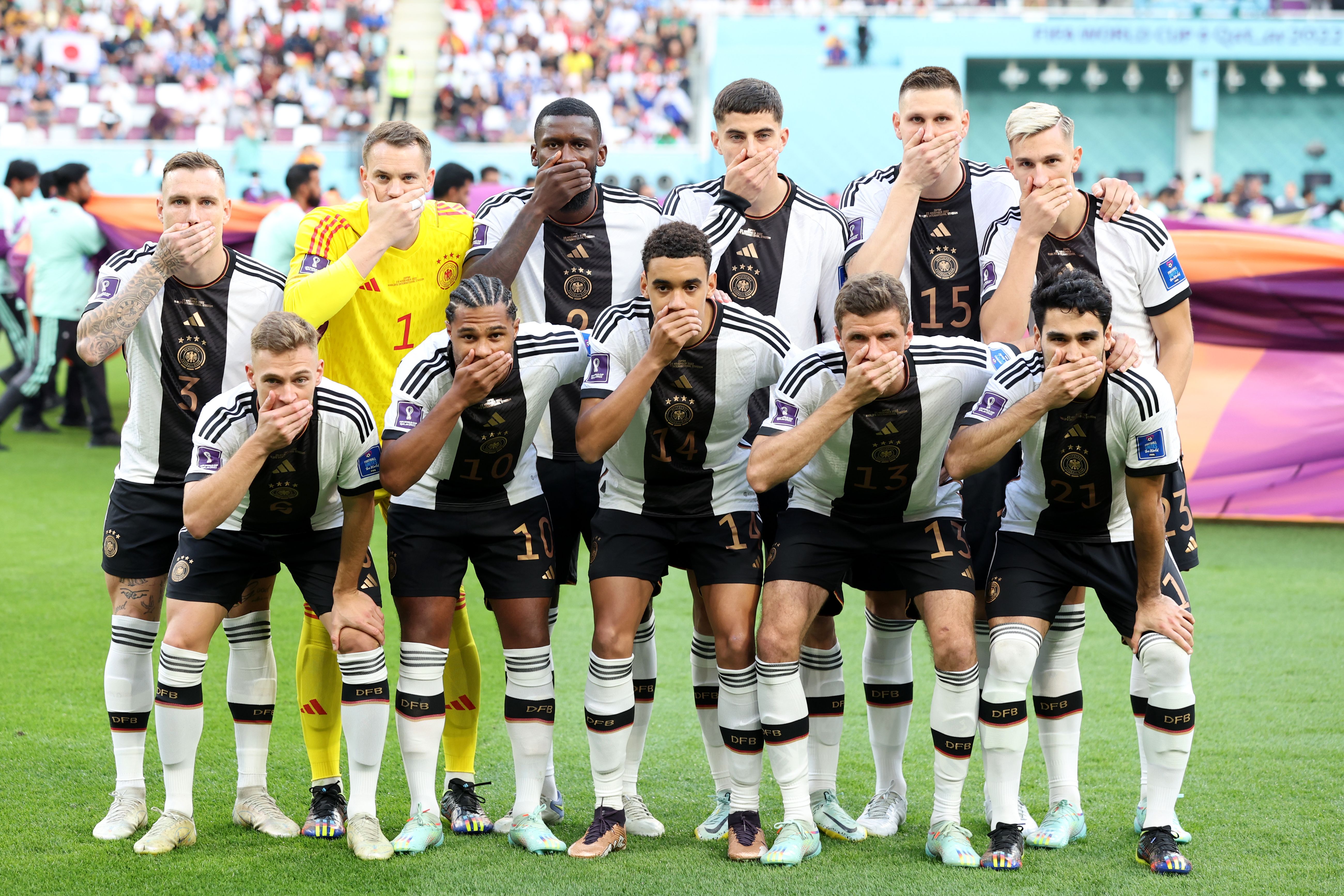 Germany players pose for their squad photo.