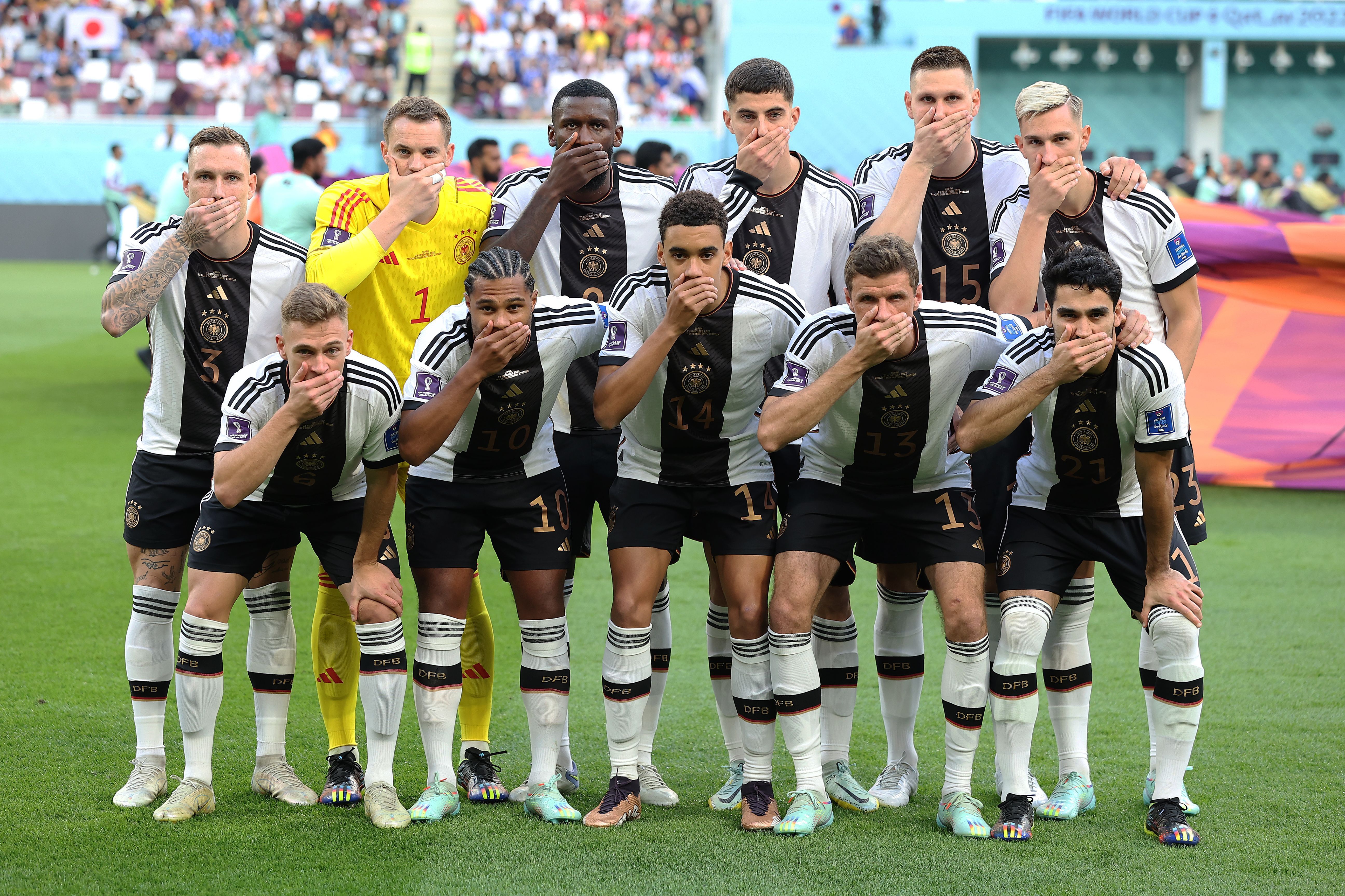 Germany's players covered their mouths against Japan