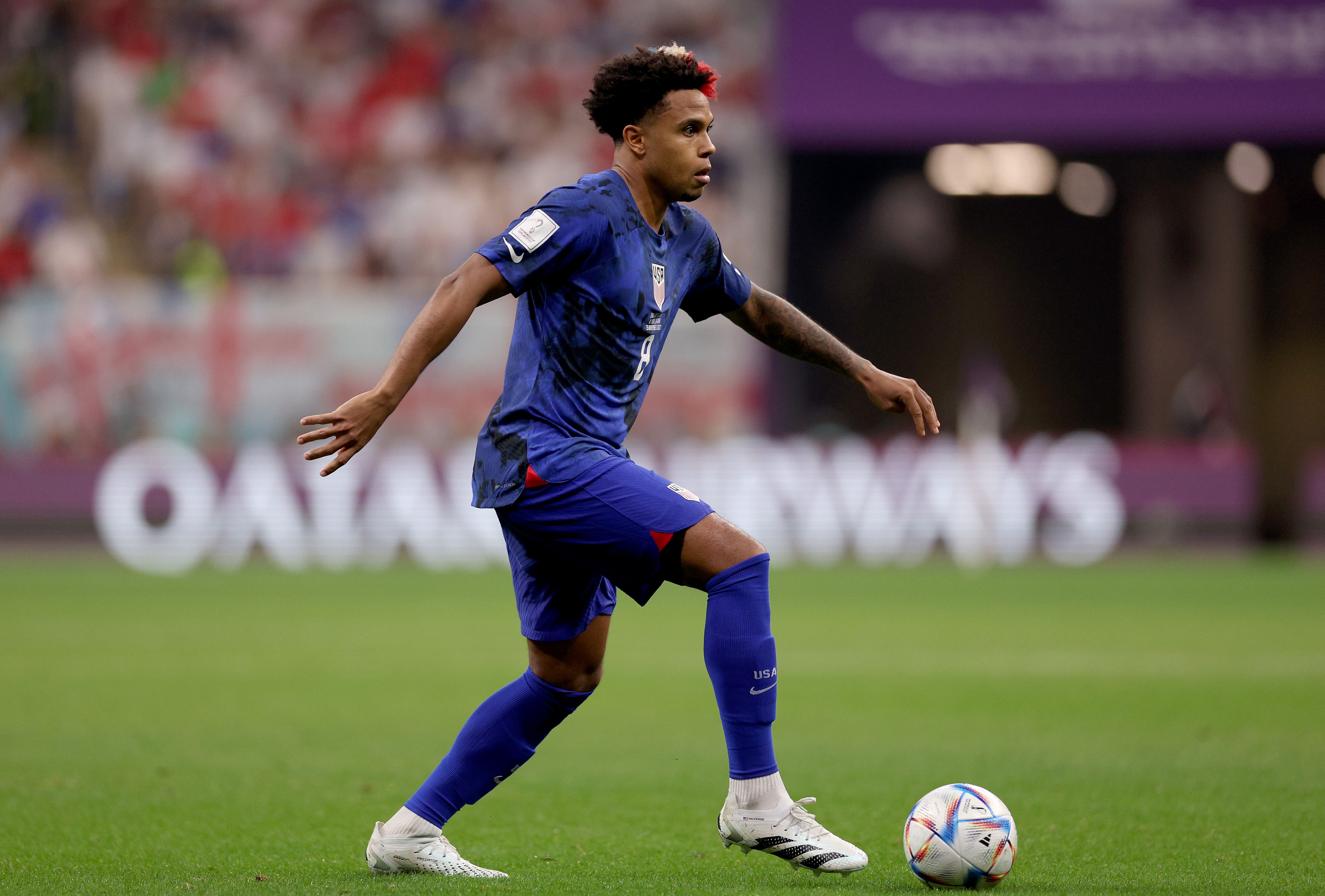 Weston McKennie #8 of United States takes the ball in the second half