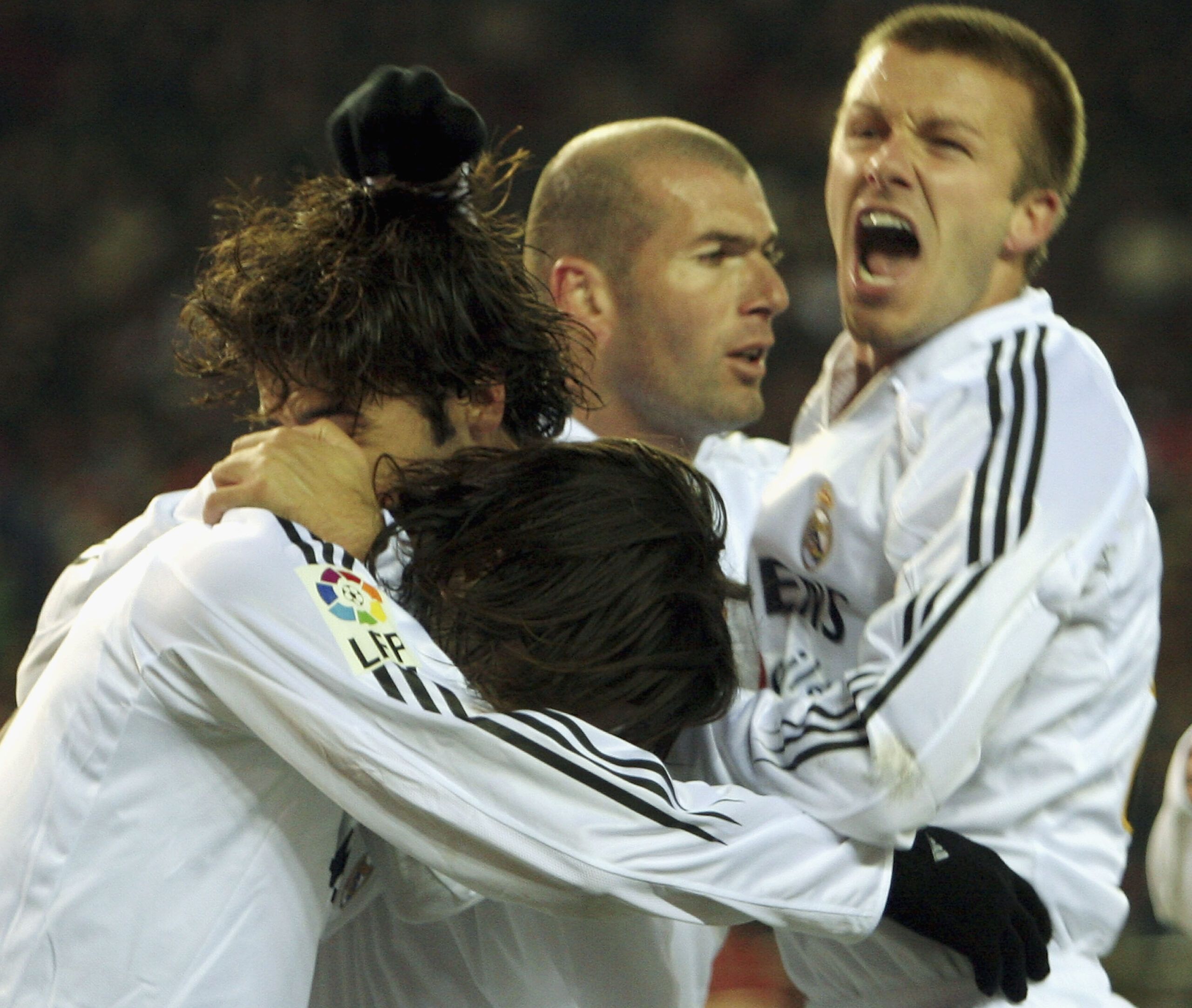 Real Madrid players celebrate vs Atletico.