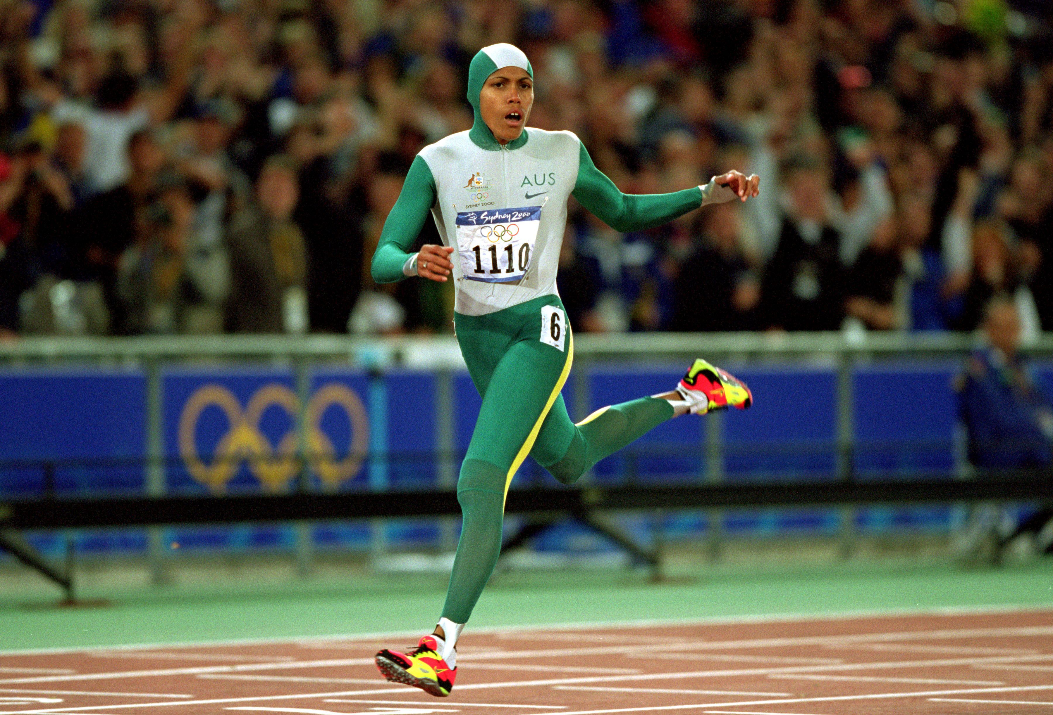 Cathy Freeman of Australia wins gold at the Sydney 2000 Olympic Games