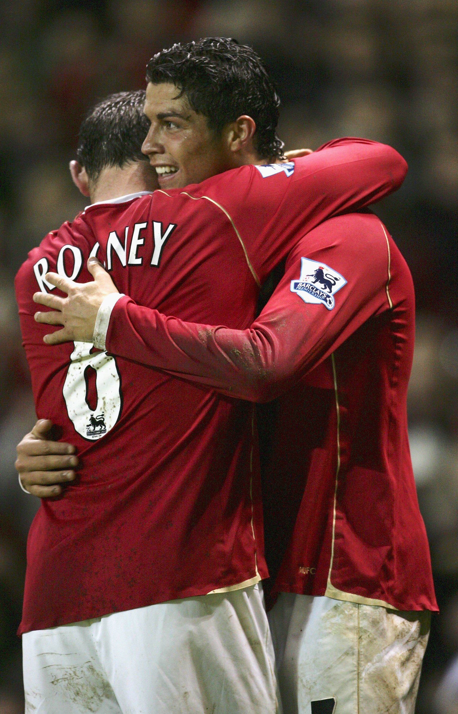 Rooney and Ronaldo at Man Utd celebrate.