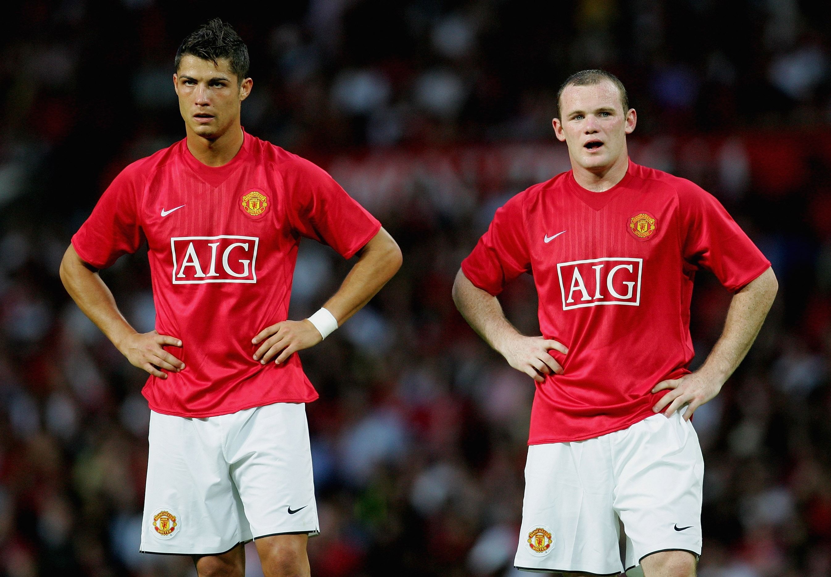 Cristiano Ronaldo and Wayne Rooney look on during a Man Utd game