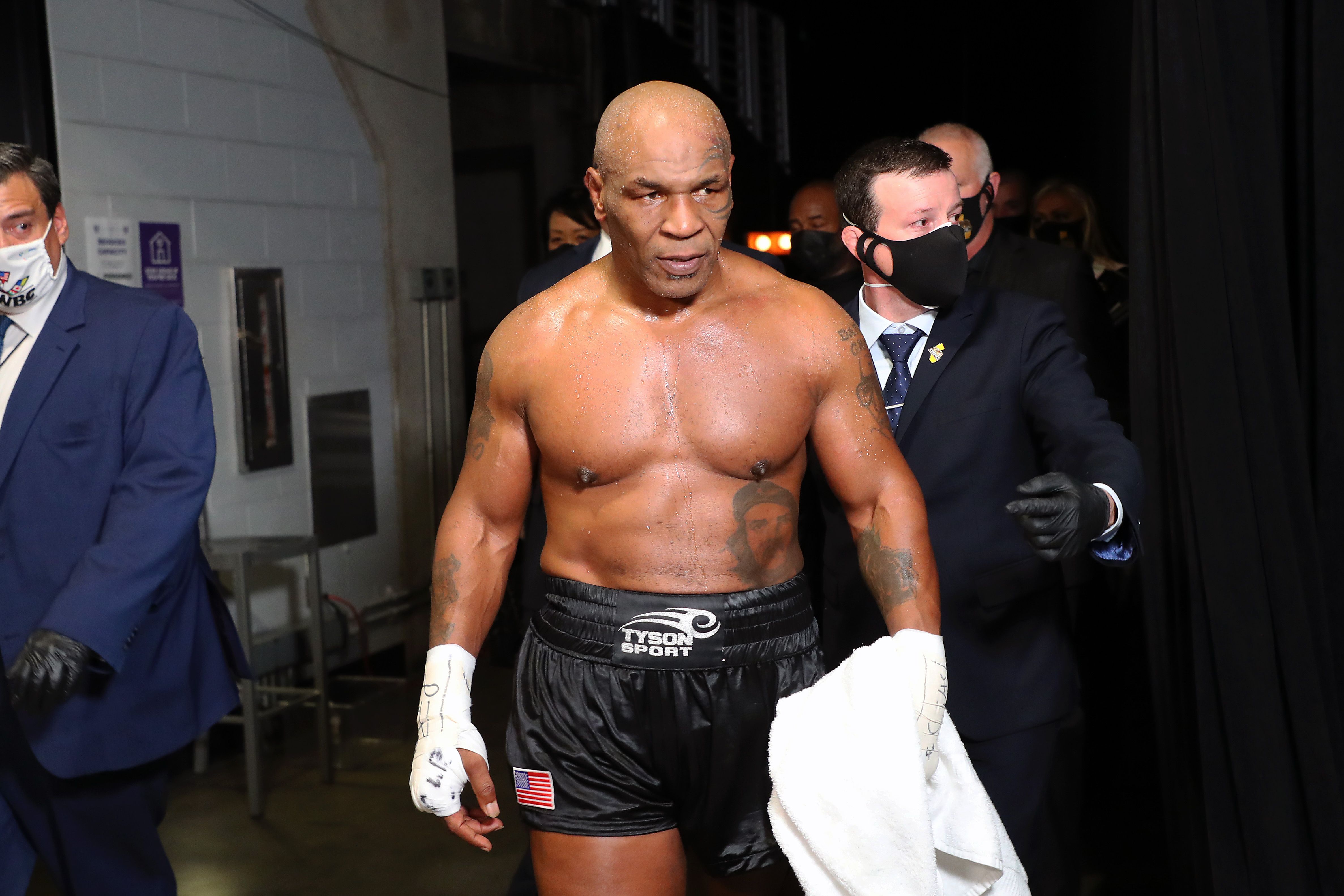 Mike Tyson approaches the ring