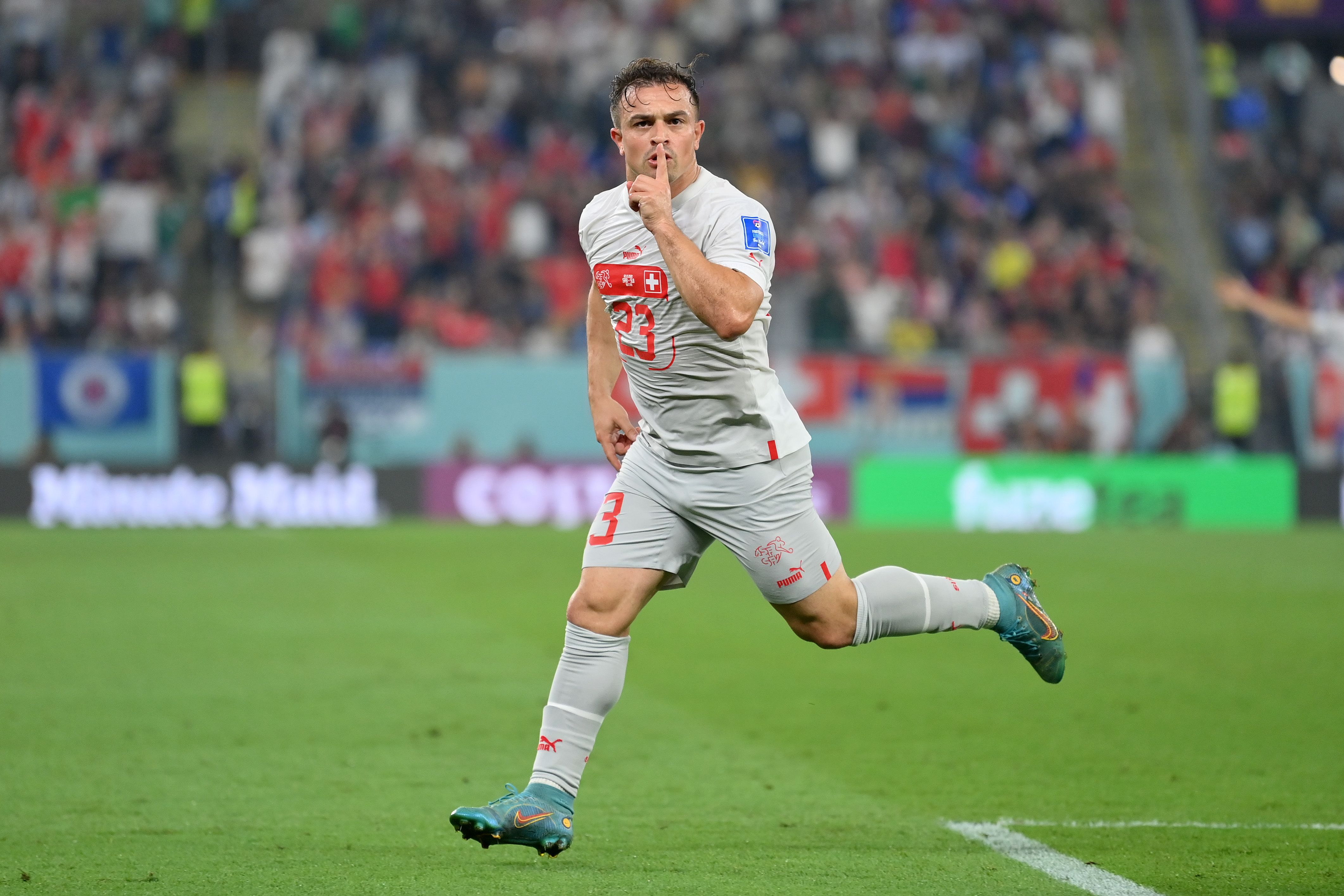 Shaqiri celebrates scoring vs Serbia