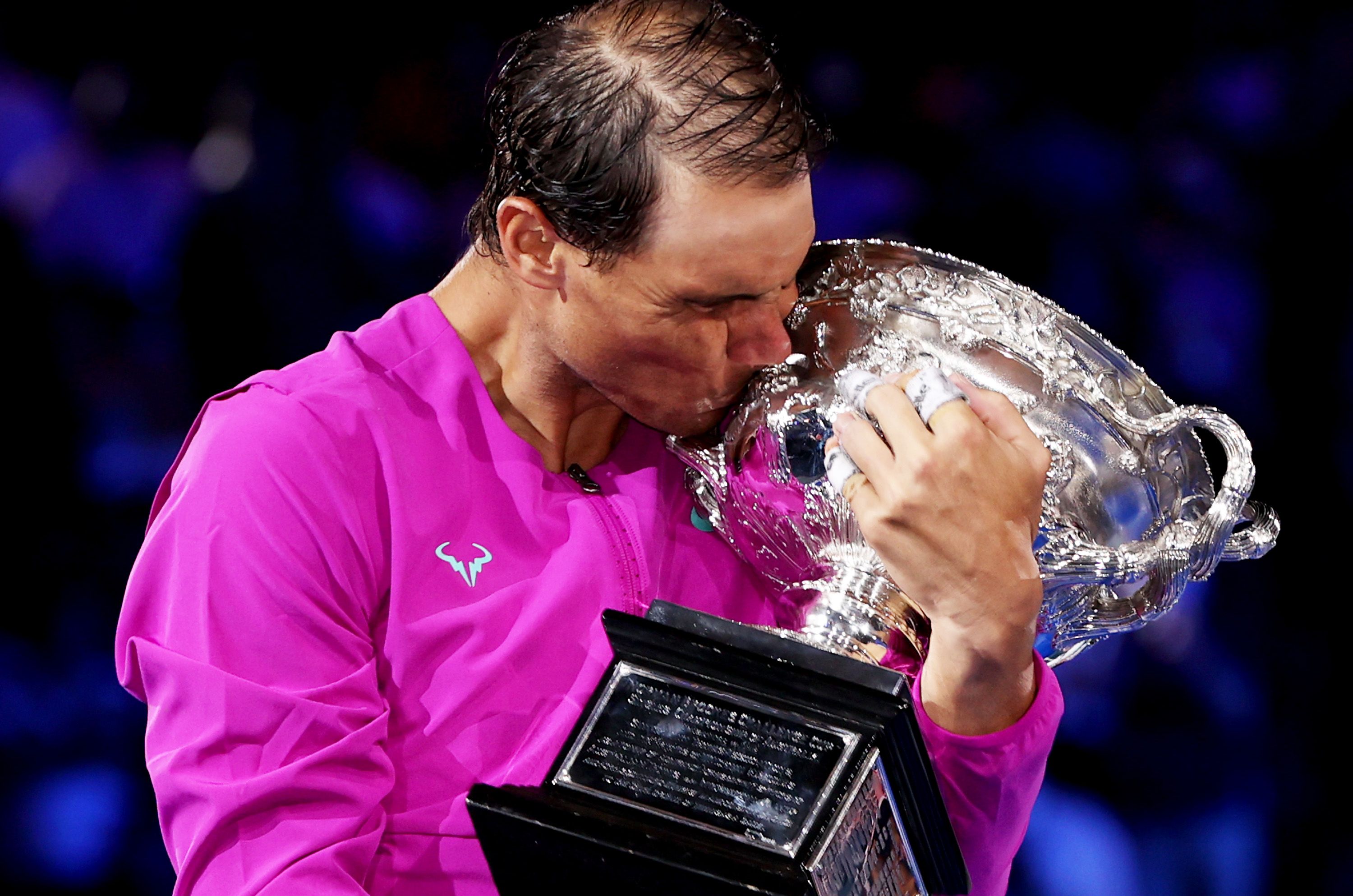 Rafael Nadal kisses the Australian Open trophy 