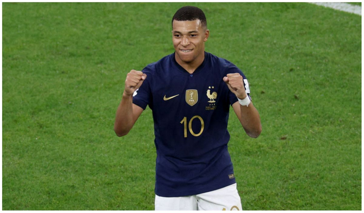DOHA, QATAR - DECEMBER 04: Kylian Mbappe #10 of France celebrates after scoring the team's third goal in the second half against Poland during the FIFA World Cup Qatar 2022 Round of 16 match between France and Poland at Al Thumama Stadium on December 04, 2022 in Doha, Qatar.