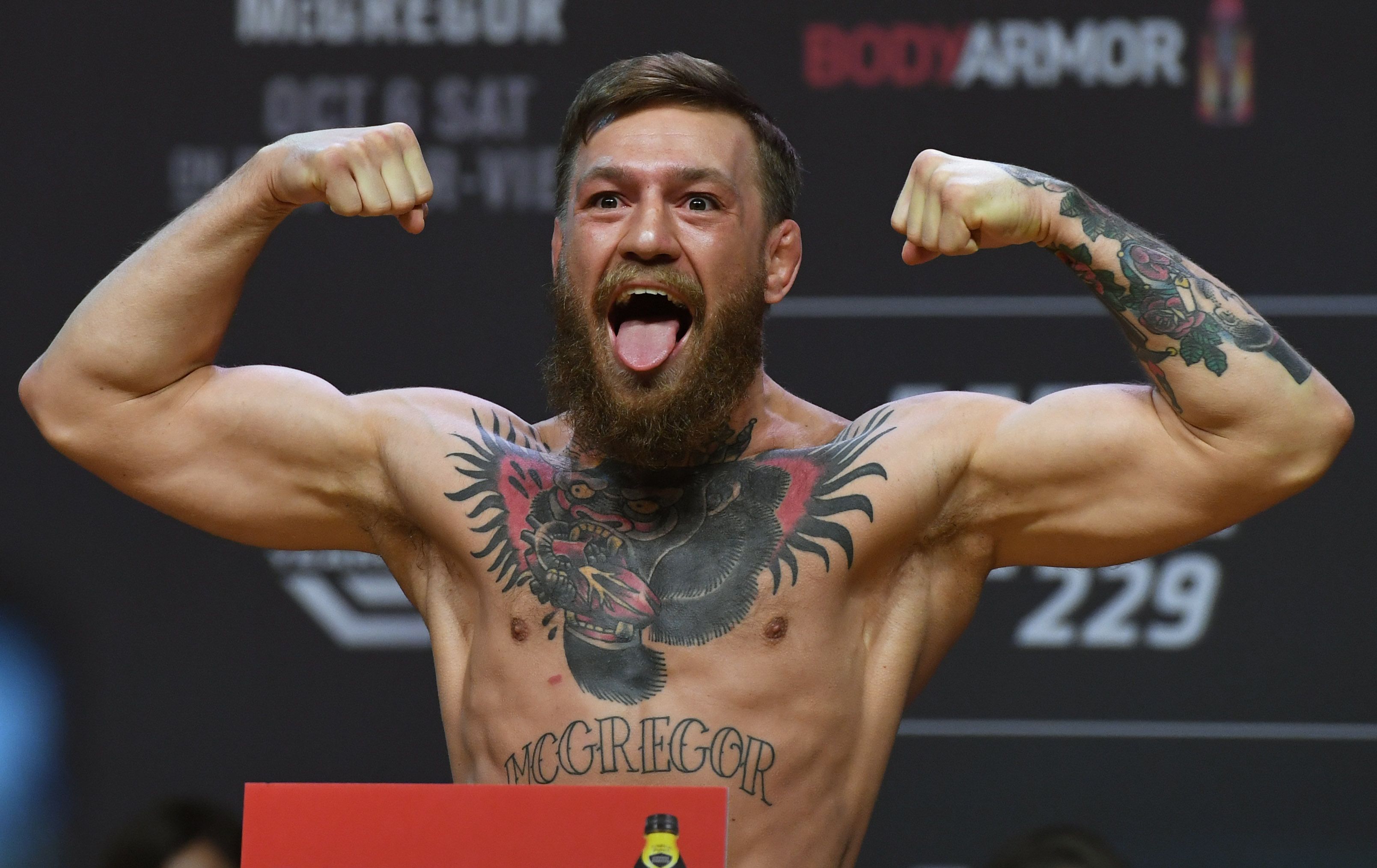 Conor McGregor poses during a ceremonial weigh-in for UFC 229