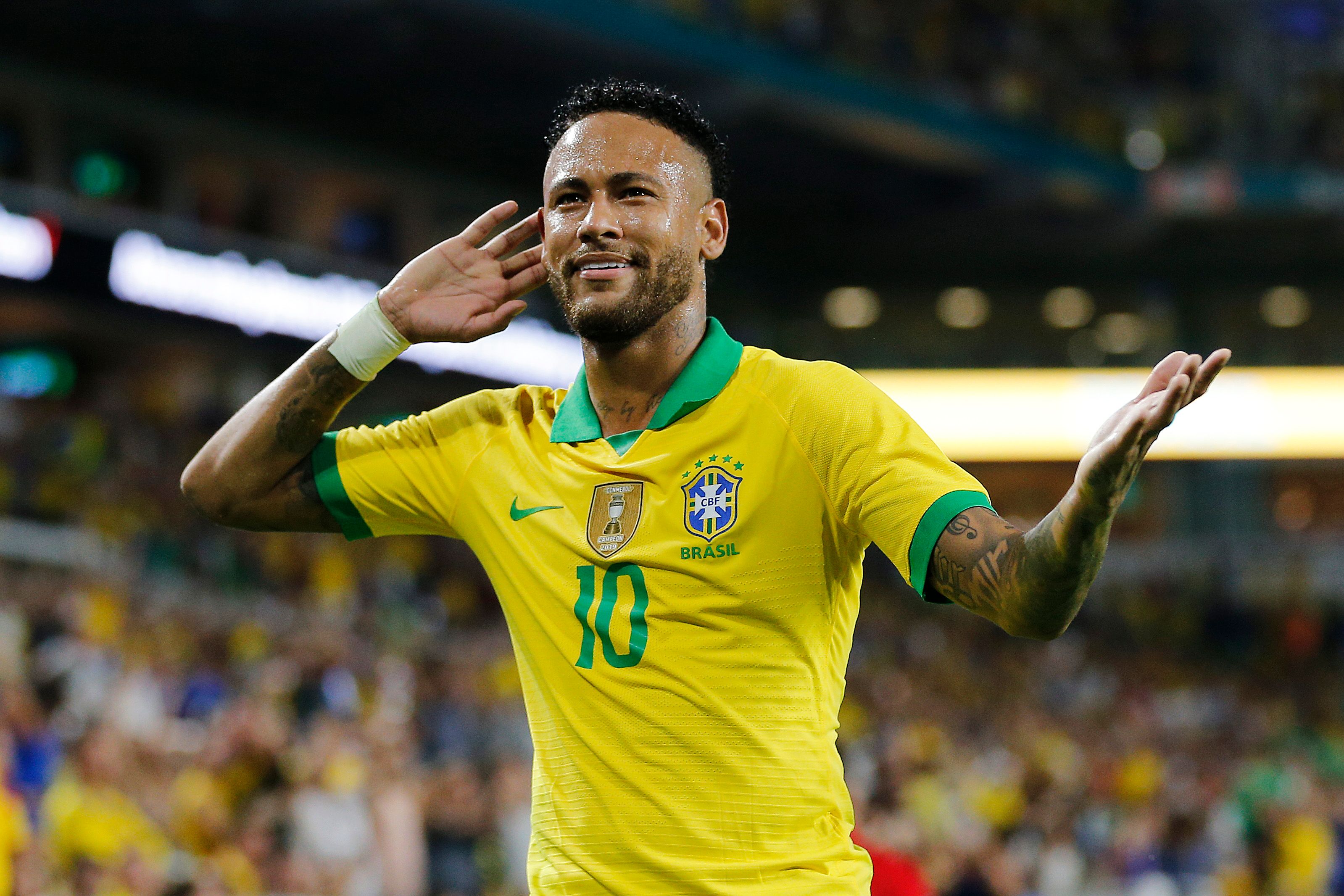 Neymar Jr of Brazil reacts after assisting Casemiro