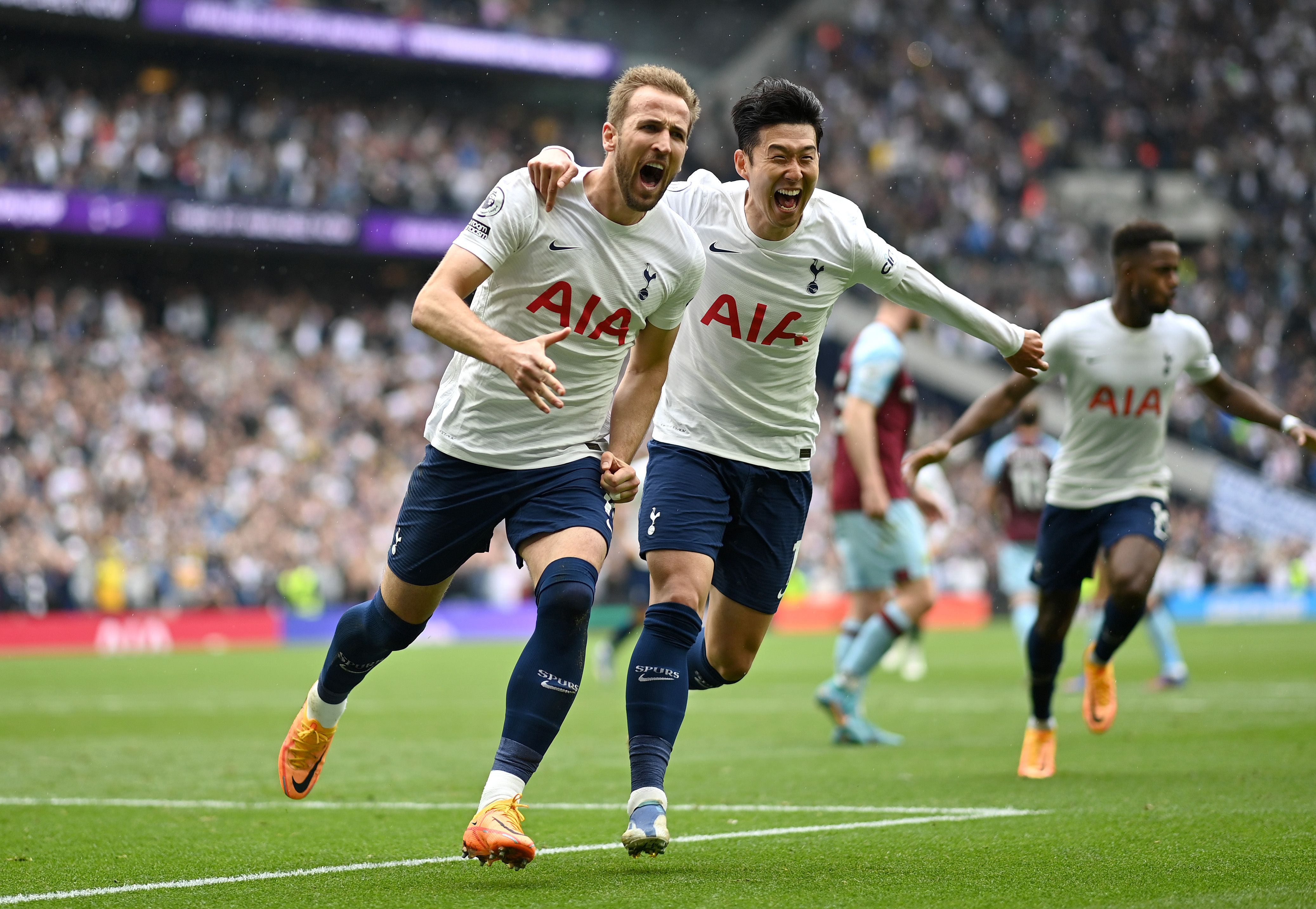 LONDON, ENGLAND - MAY 15: Harry Kane celebrates with Heung-Min Son of Tottenham Hotspur after scoring their team's first goal during the Premier League match between Tottenham Hotspur and Burnley at Tottenham Hotspur Stadium on May 15, 2022 in London, England. (Photo by Shaun Botterill/Getty Images)