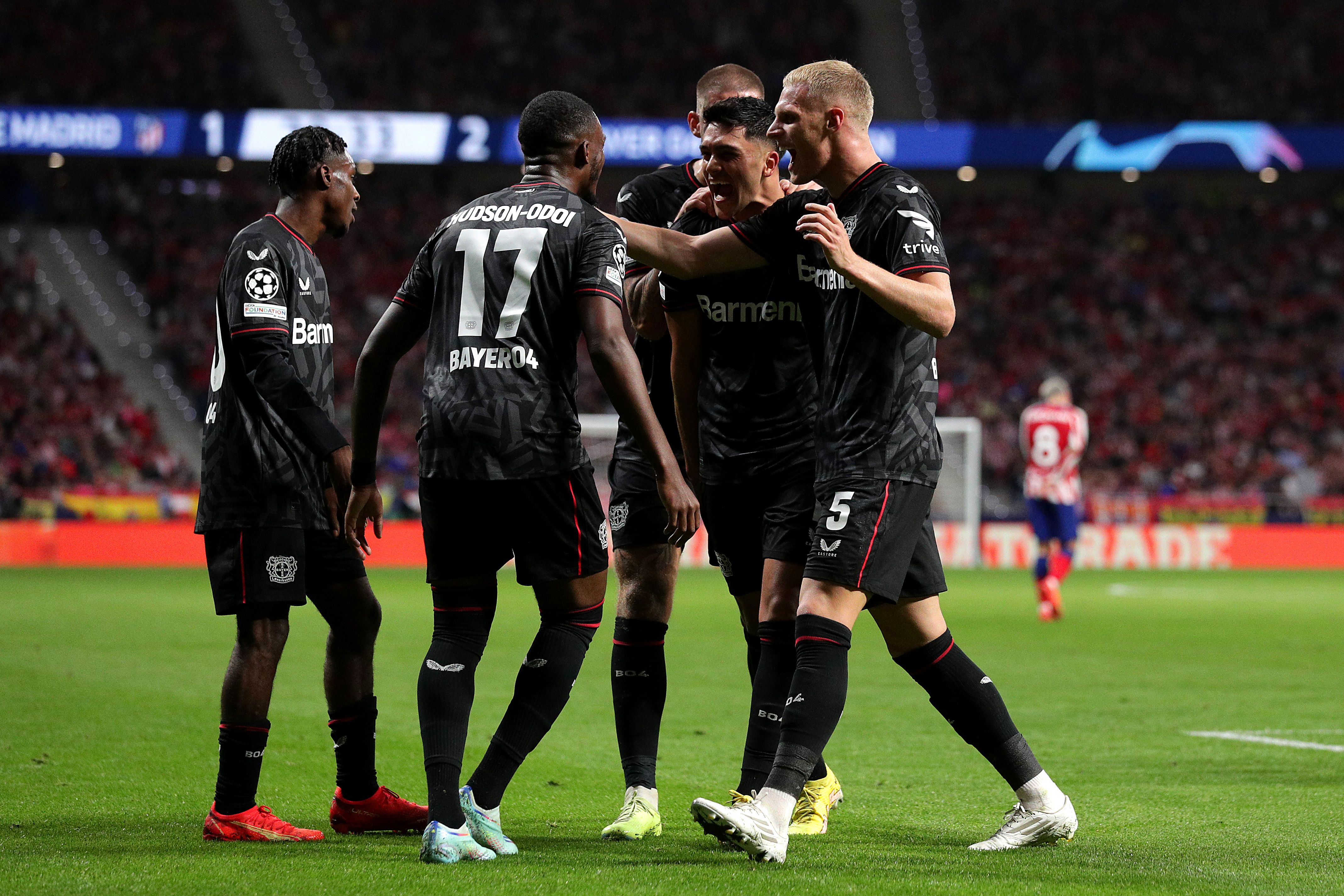 Bayer Leverkusen celebrate scoring in the Champions League.