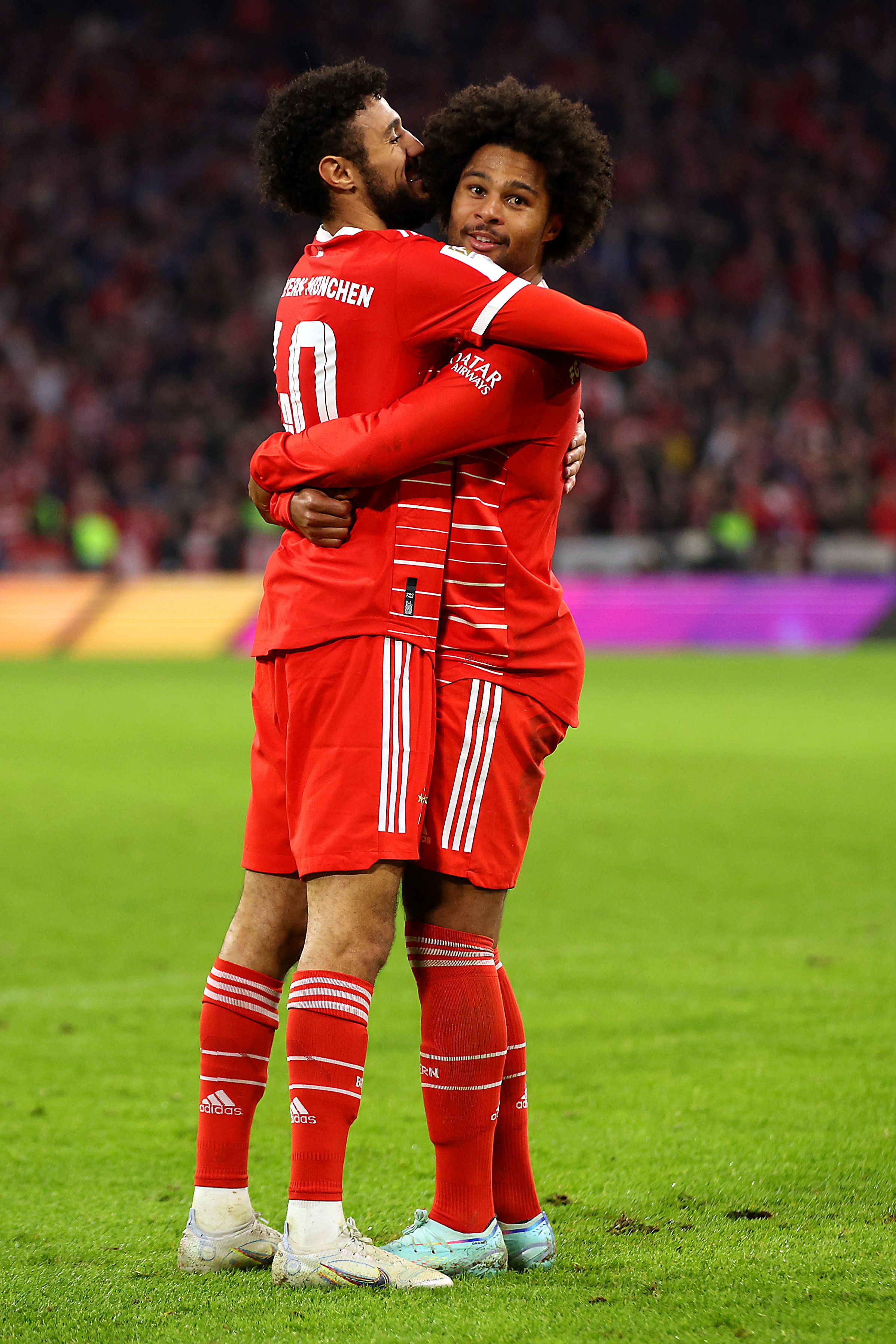 Gnabry and Mazraoui celebrate a Bayern goal.