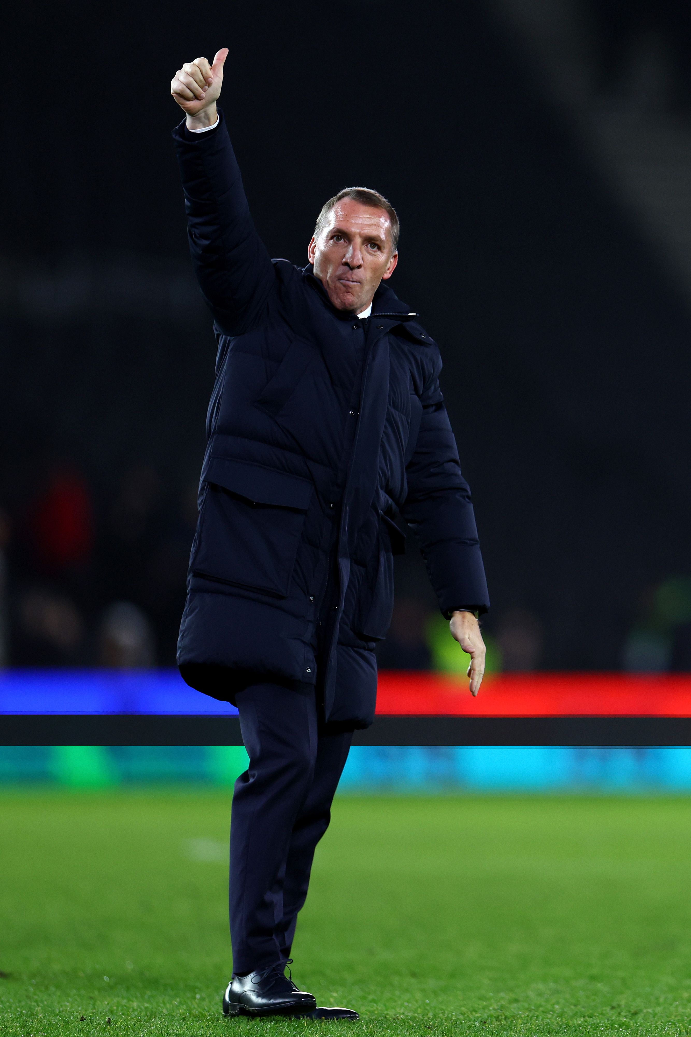 Rodgers gives a thumbs up to Leicester fans.