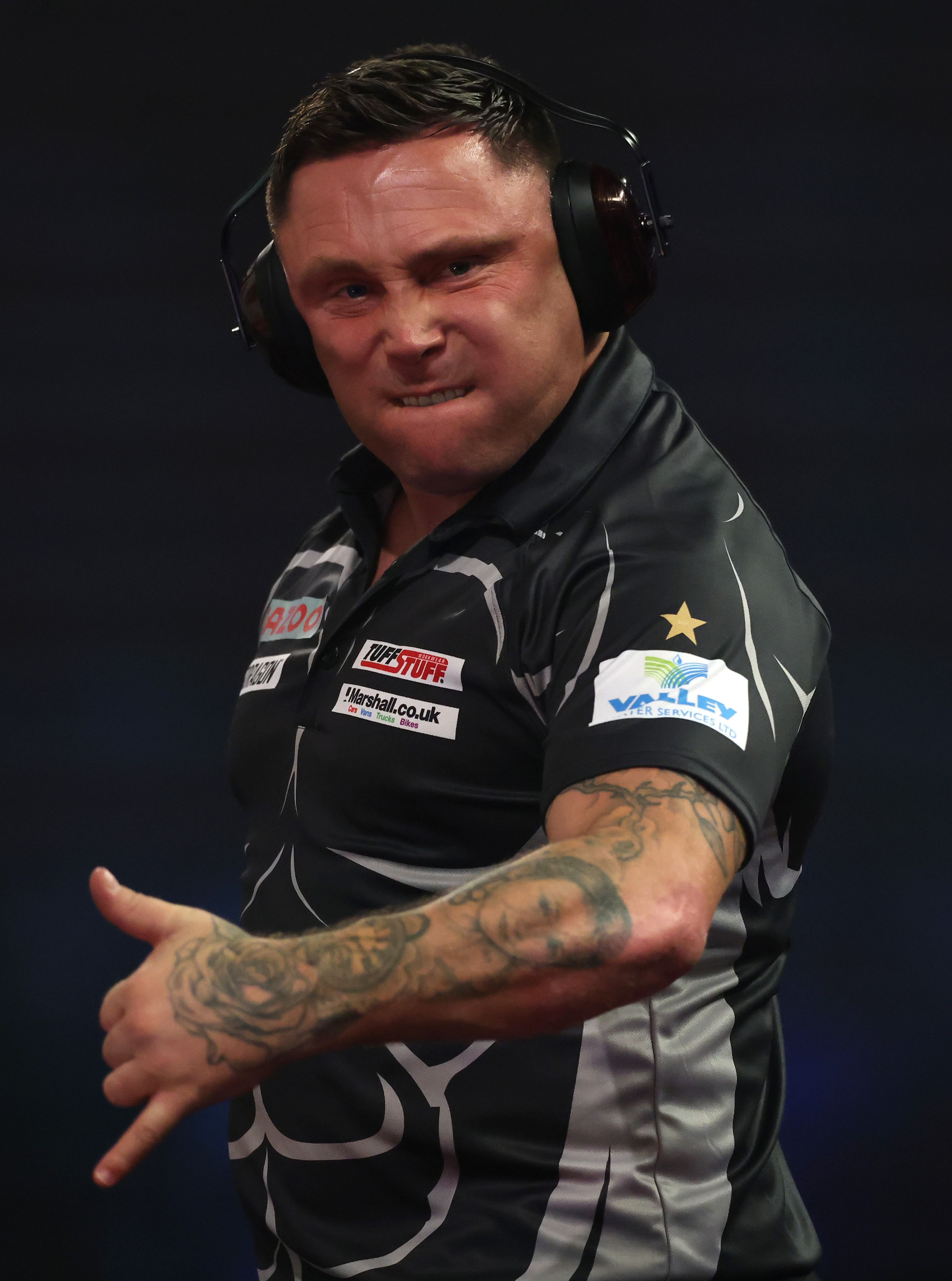 World Darts Championship: Why was Gerwyn Price wearing ear defenders?