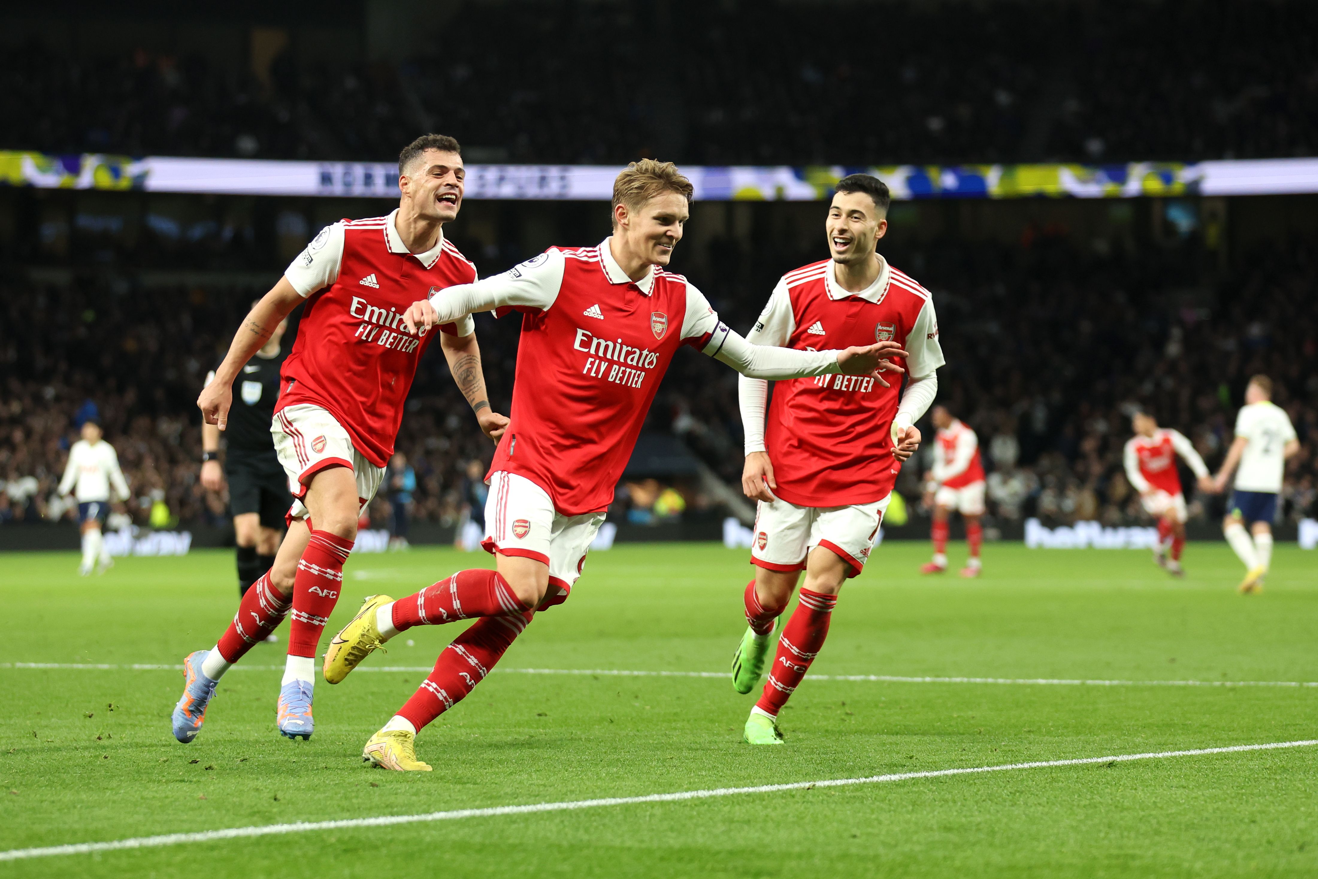 Martin Odegaard of Arsenal celebrates after scoring the team's second goal during the Premier League match between Tottenham Hotspur and Arsenal FC at Tottenham Hotspur Stadium on January 15, 2023 in London, England
