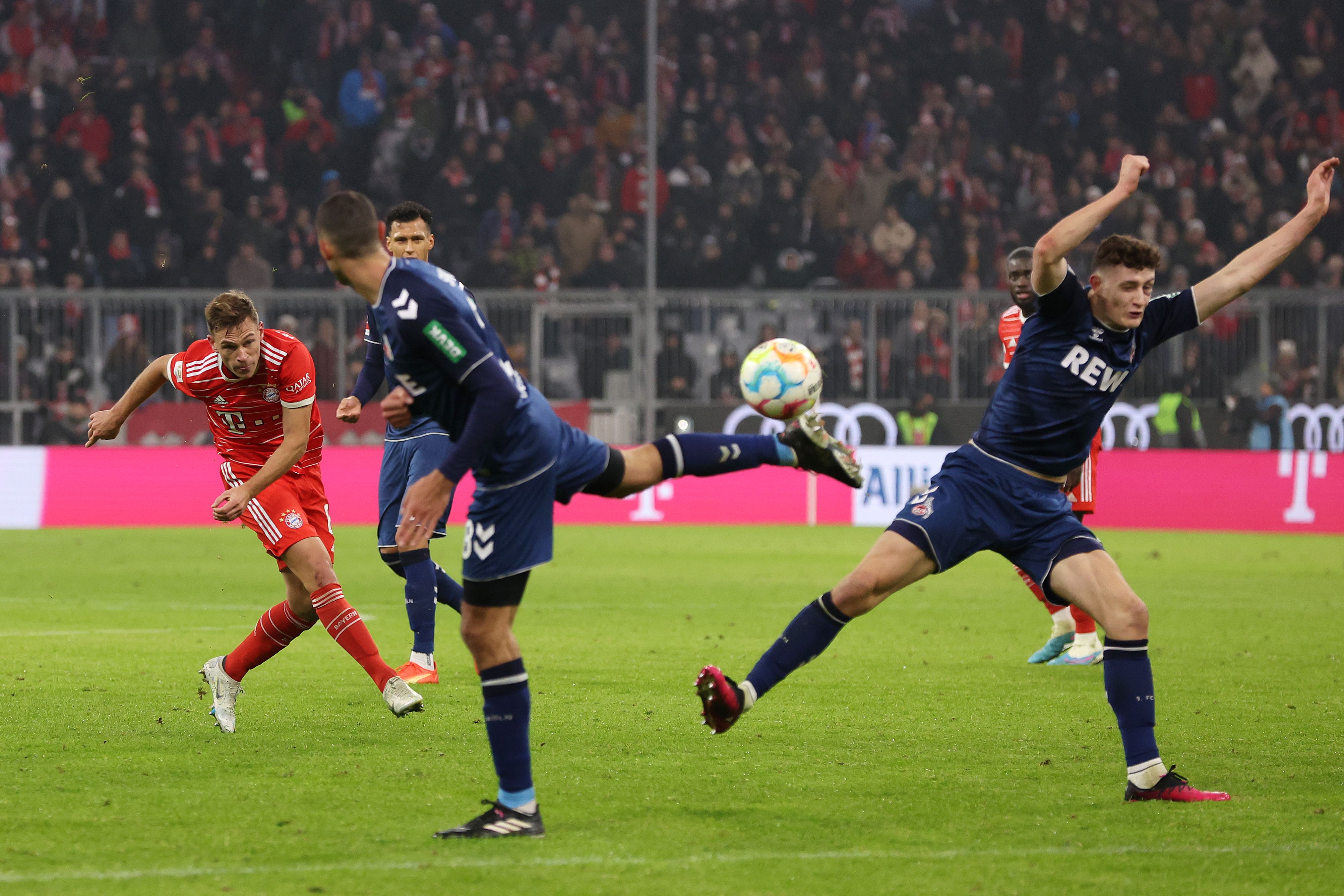 Joshua Kimmich strikes the ball for Bayern Munich