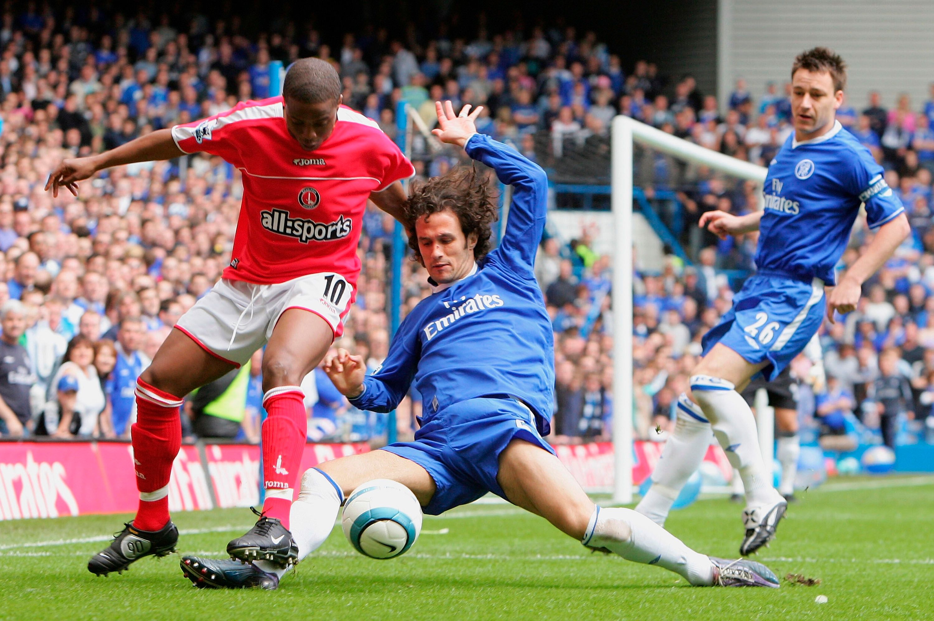 LONDON - MAY 7: Ricardo Carvalho of Chelsea tackles Kevin Lisbie of Charlton during the Barclays Premiership match between Chelsea and Charlton at Stamford Bridge on May 7, 2005 in London, England. (Photo by Mike Hewitt/Getty Images)