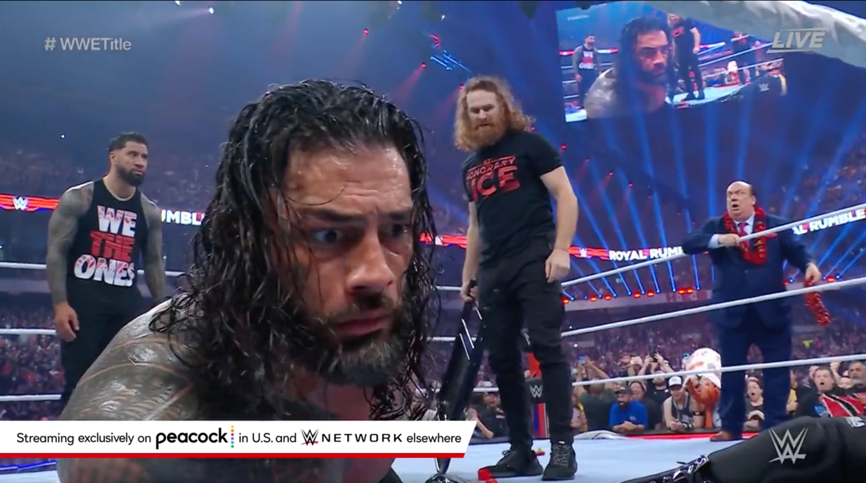 Roman Reigns stunned by Sami Zayn's chair shot