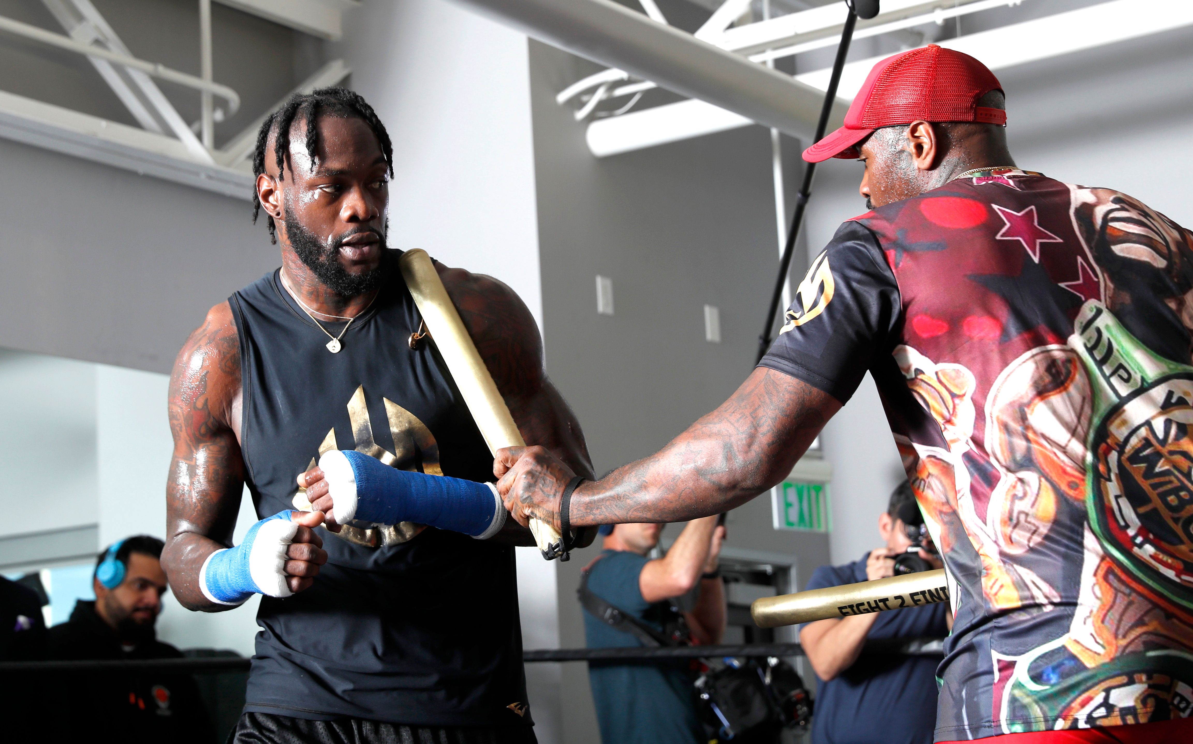 Deontay Wilder pictured with his trainer Malik Scott