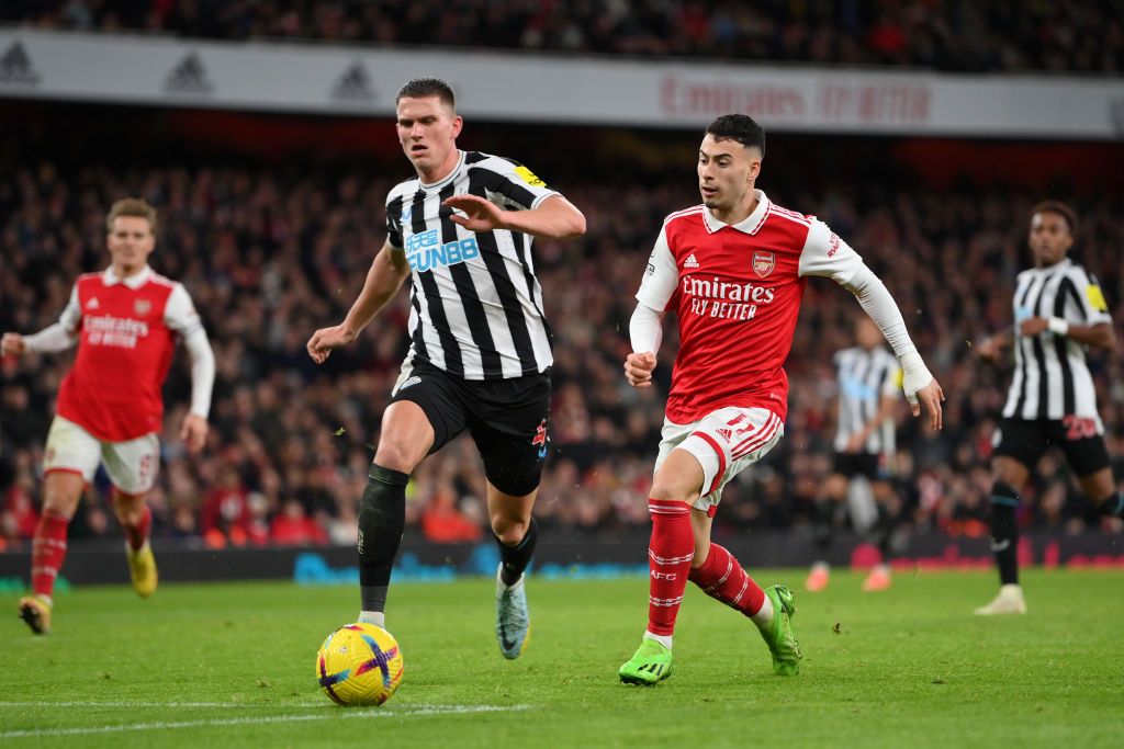Newcastle United's Sven Botman beats Arsenal's Gabriel Martinelli to the ball