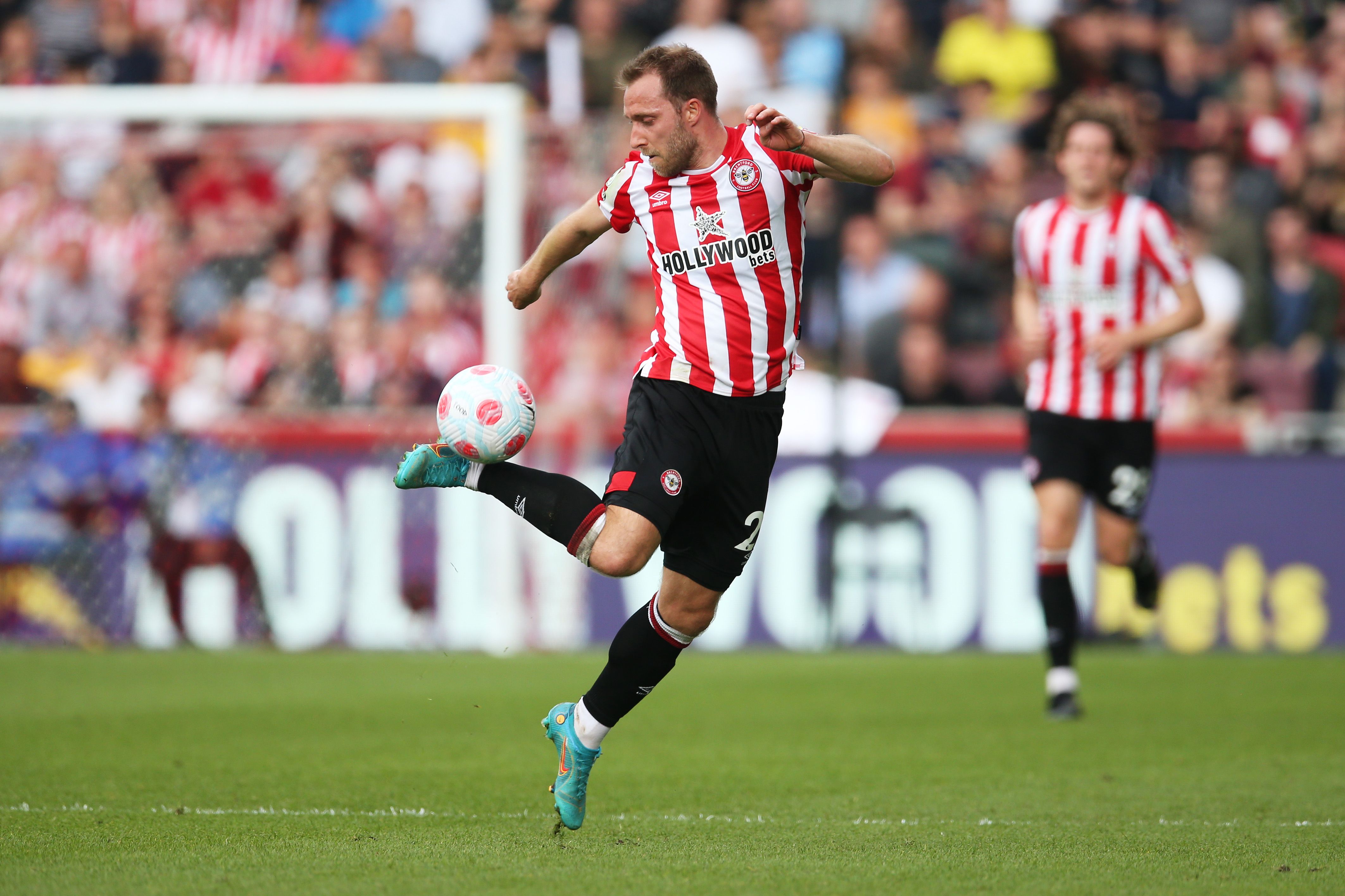 BRENTFORD, ENGLAND - MAY 07: Christian Eriksen of Brentford controls the ball during the Premier League match between Brentford and Southampton at Brentford Community Stadium on May 07, 2022 in Brentford, England. (Photo by Steve Bardens/Getty Images)