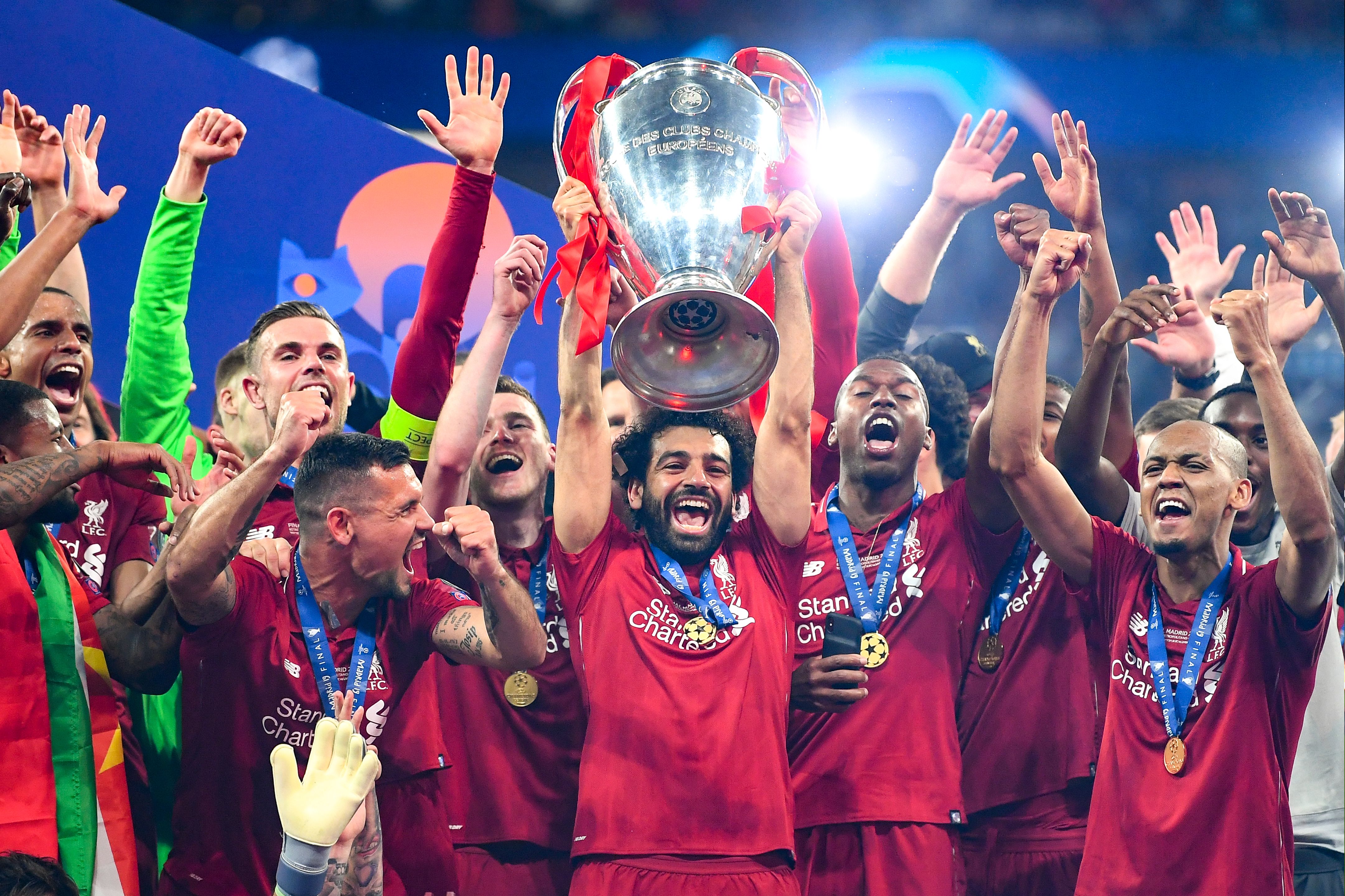 Mohamed Salah of Liverpool celebrates with the Champions League Trophy after winning the UEFA Champions League Final between Tottenham Hotspur and Liverpool at Estadio Wanda Metropolitano on June 01, 2019 in Madrid, Spain.