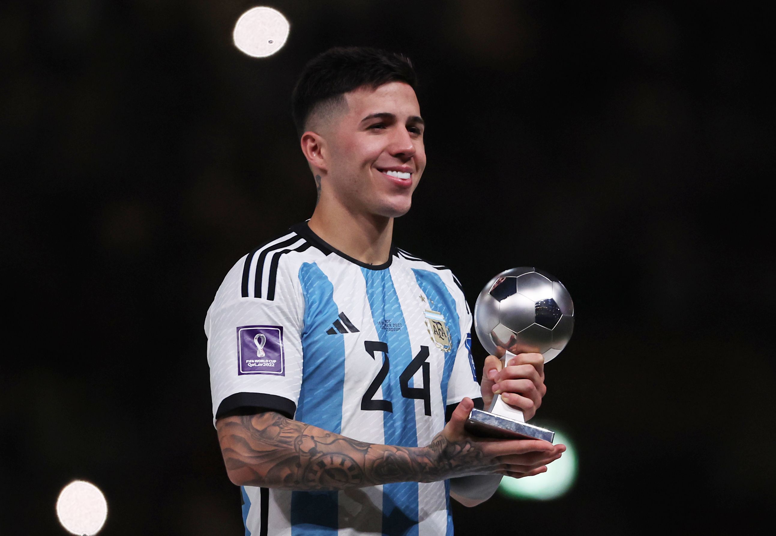 Enzo Fernandez of Argentina poses with an award
