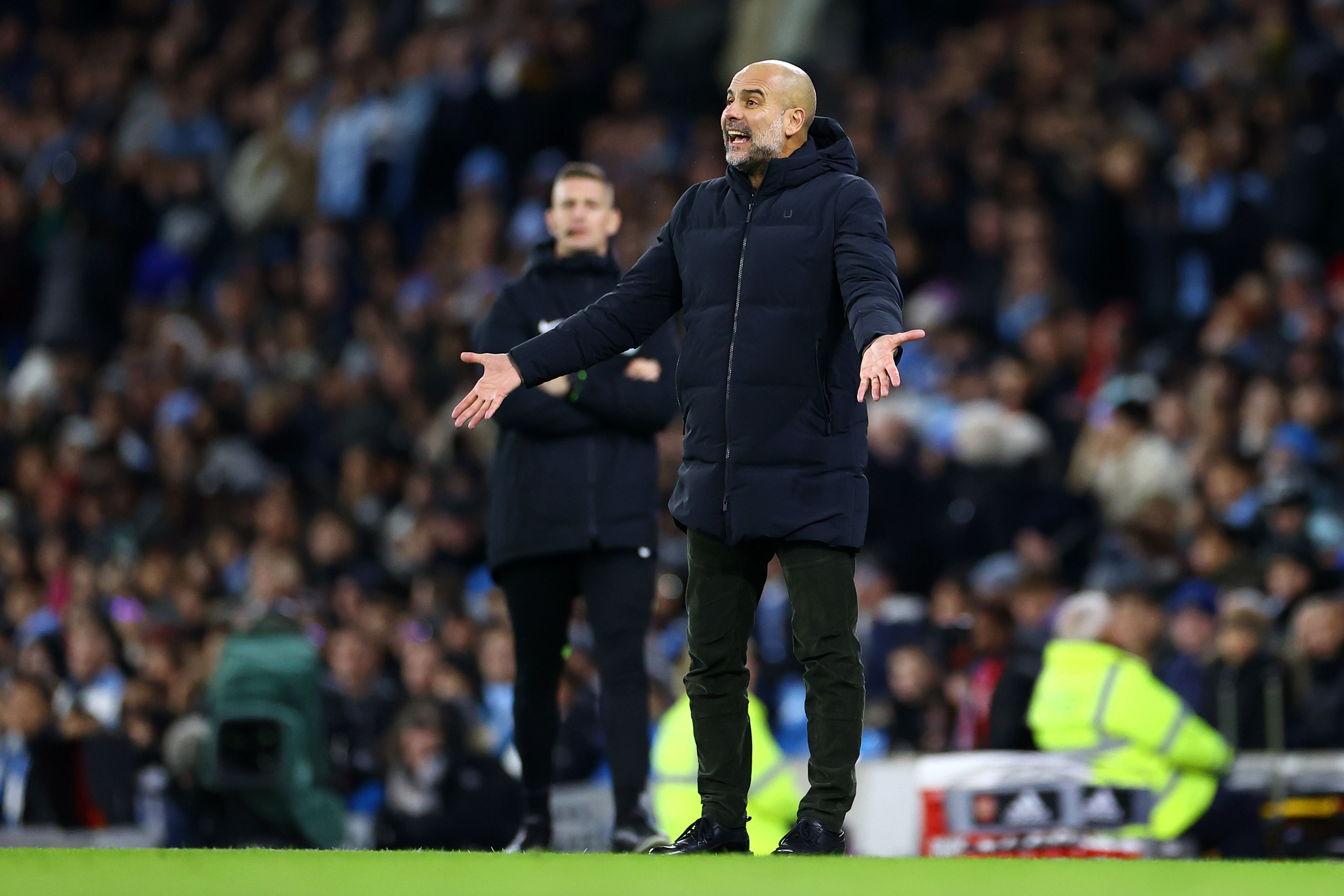 Pep Guardiola of Manchester City gestures from the touchline