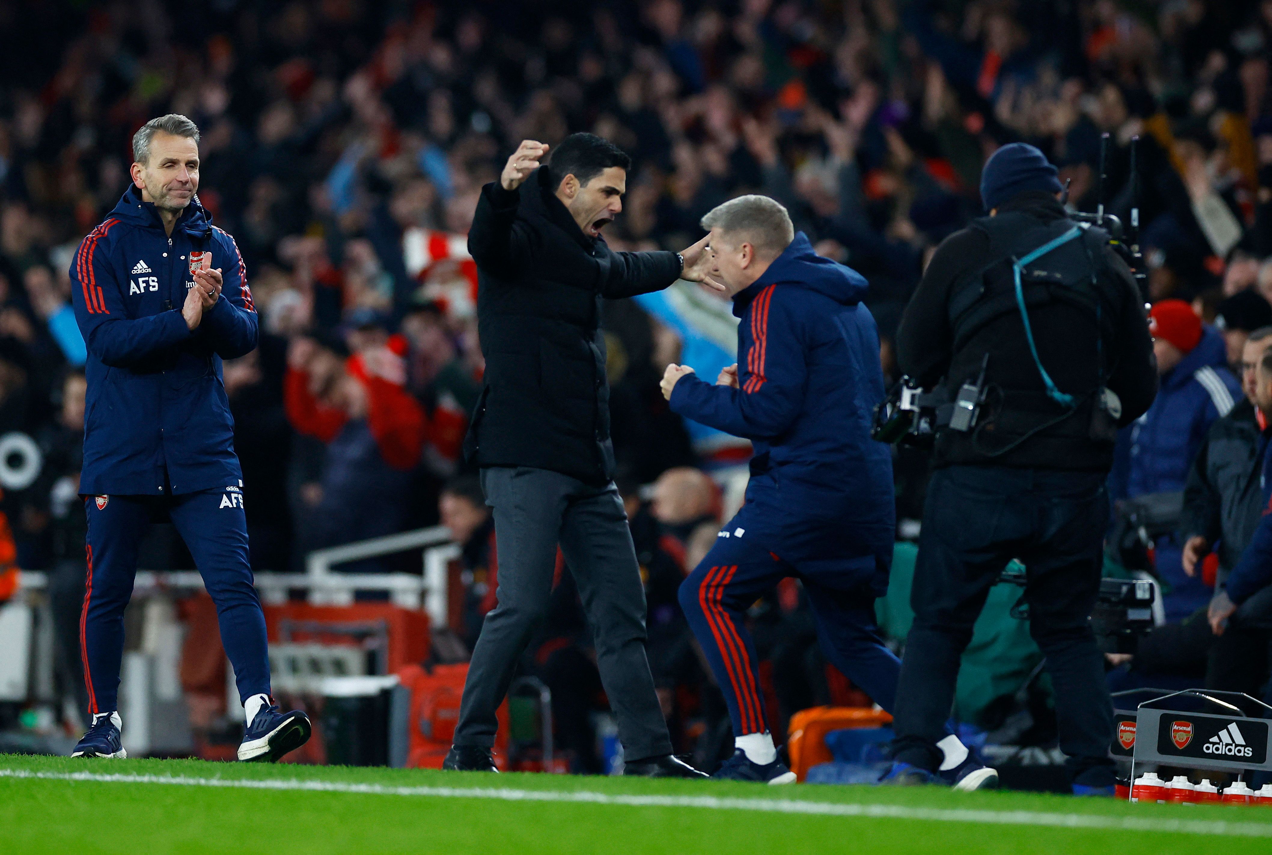 Arsenal manager Mikel Arteta celebrating after win