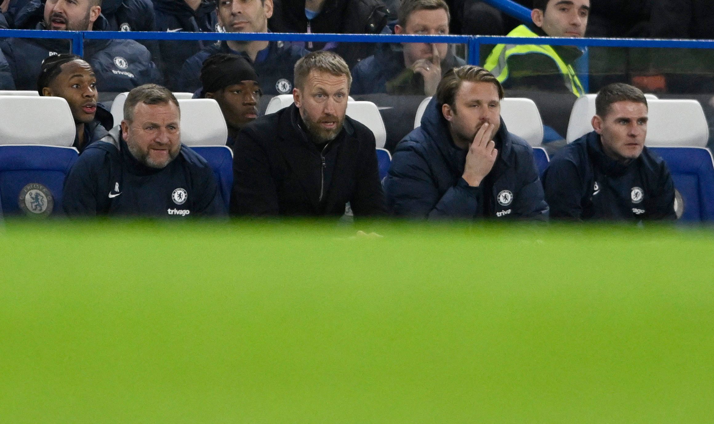 Chelsea manager Graham Potter sitting down with coaching staff