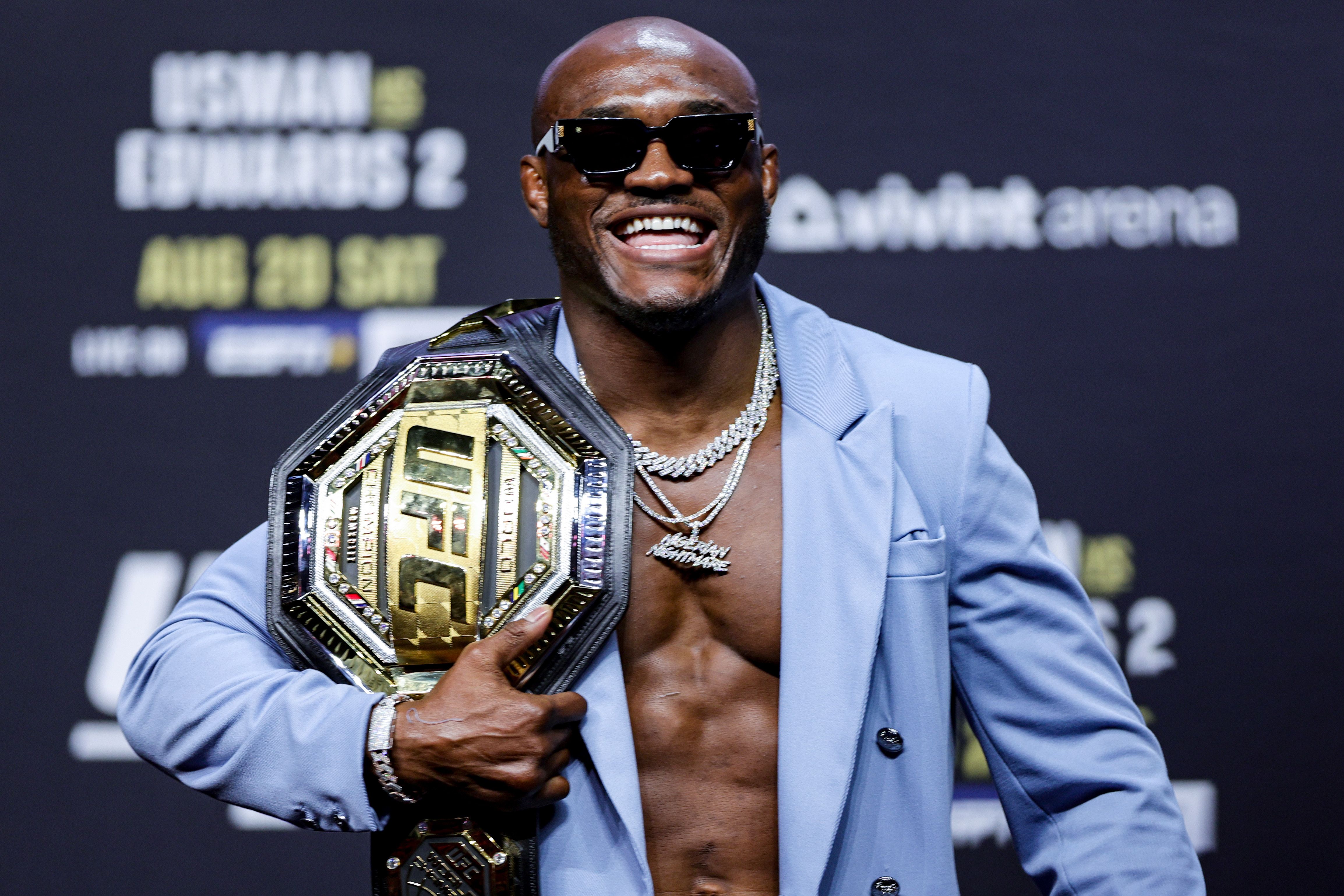 Kamaru Usman is seen on stage during the UFC 276 ceremonial weigh-in