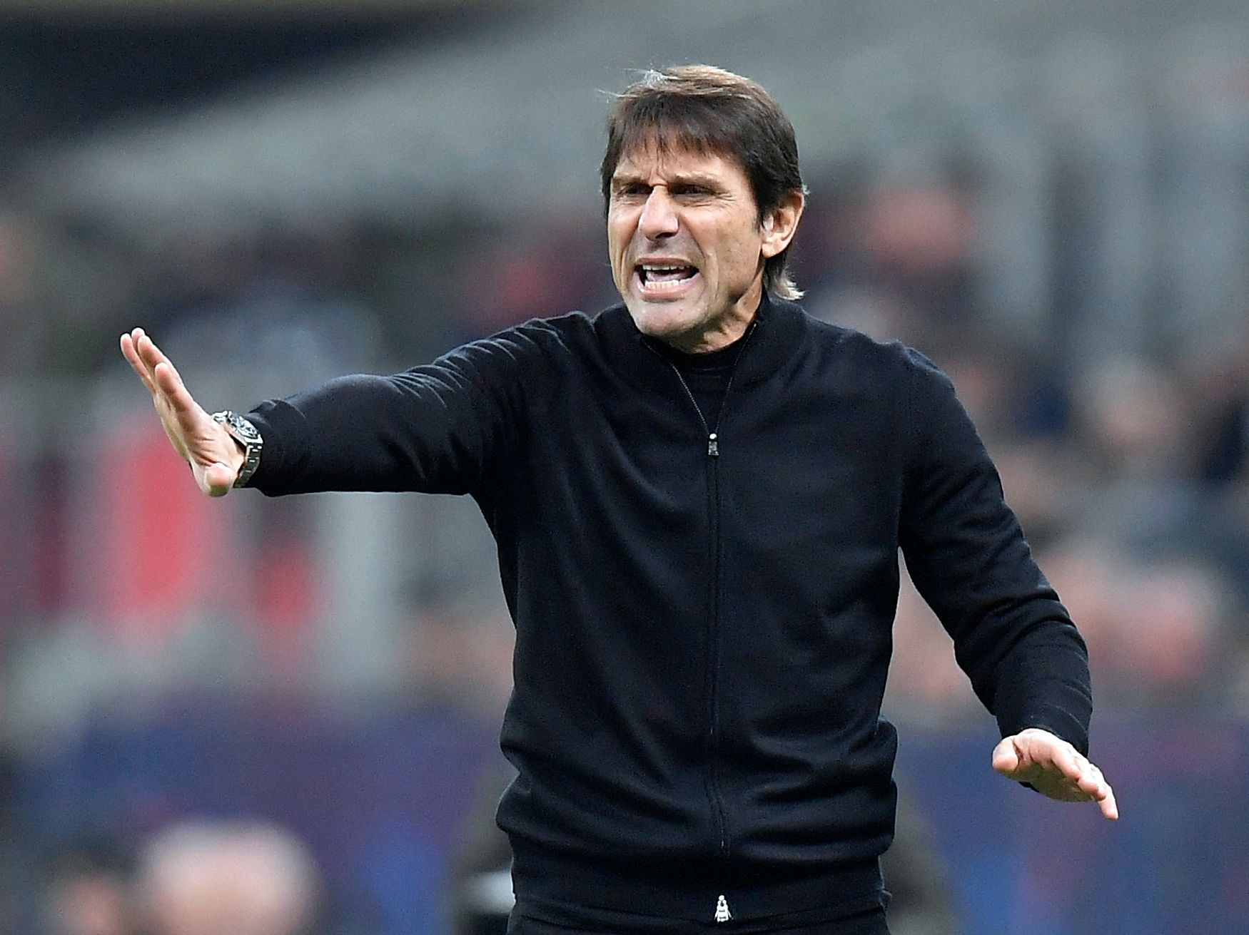 Tottenham Hotspur manager Antonio Conte giving out instructions