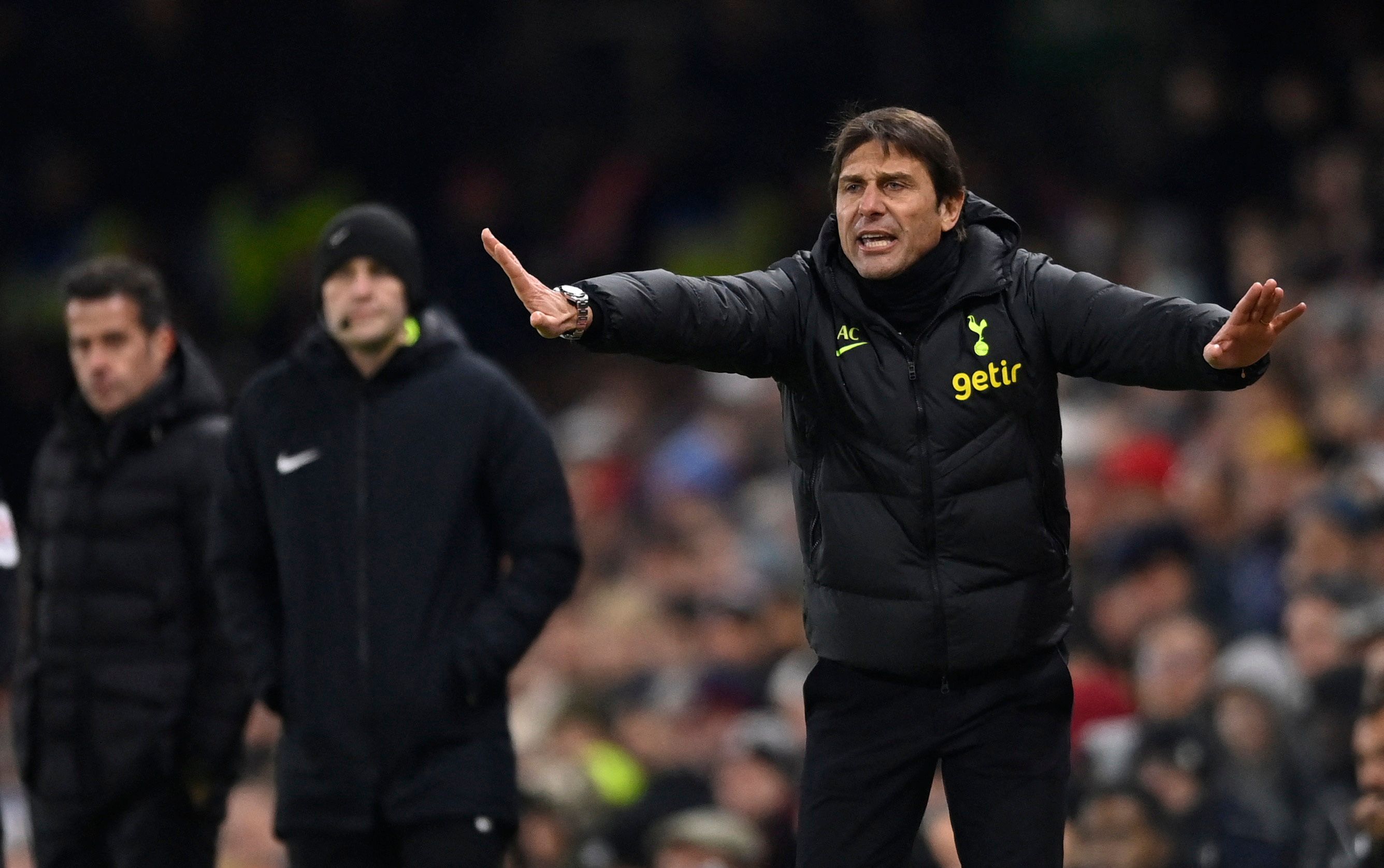 Tottenham Hotspur manager Antonio Conte giving instructions to player