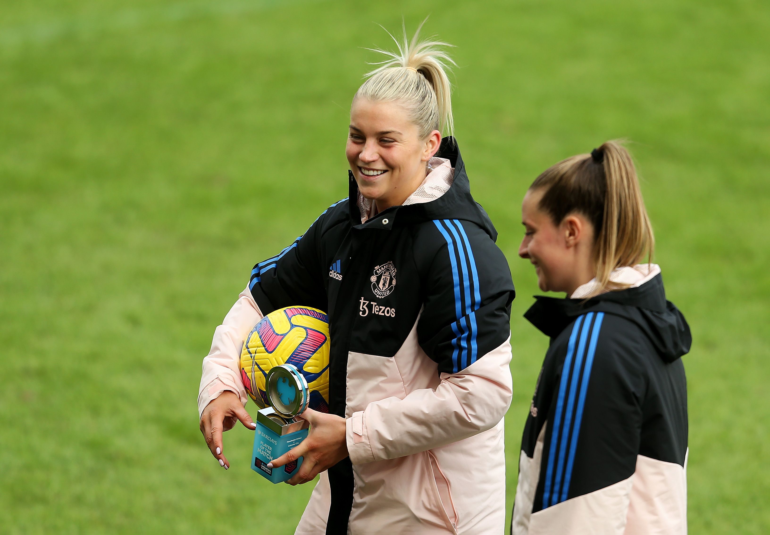 Alessia Russo of Man United holds the match ball 