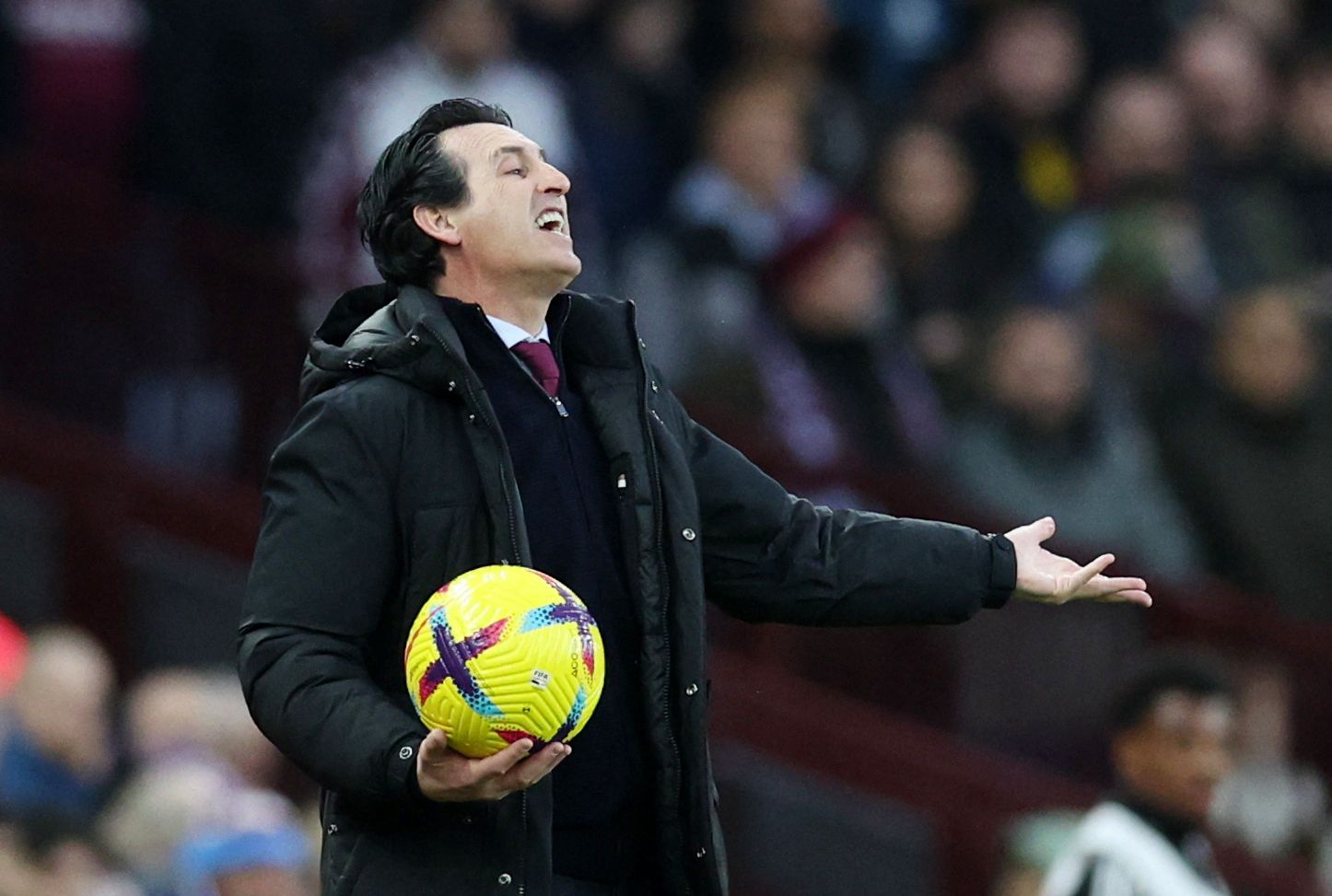 Aston Villa manager Unai Emery holding ball
