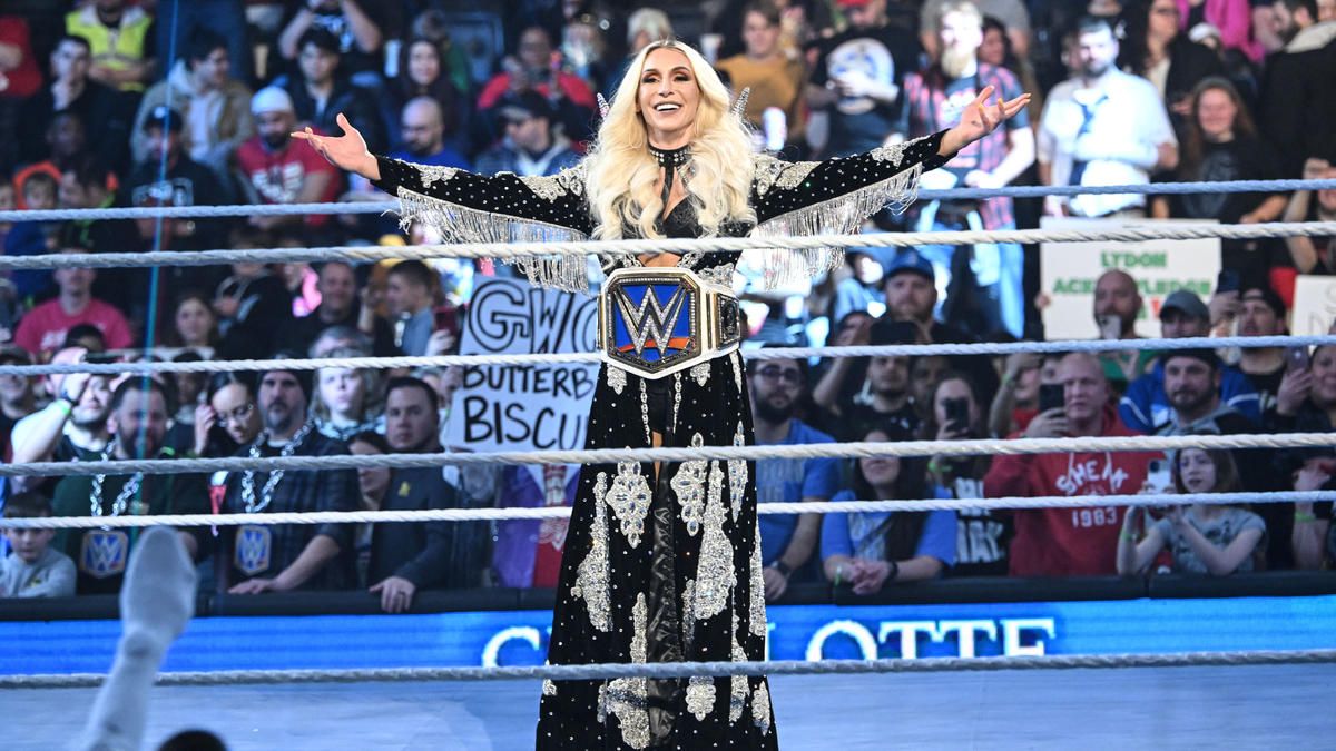 Charlotte Flair poses in front of the crowd on WWE SmackDown