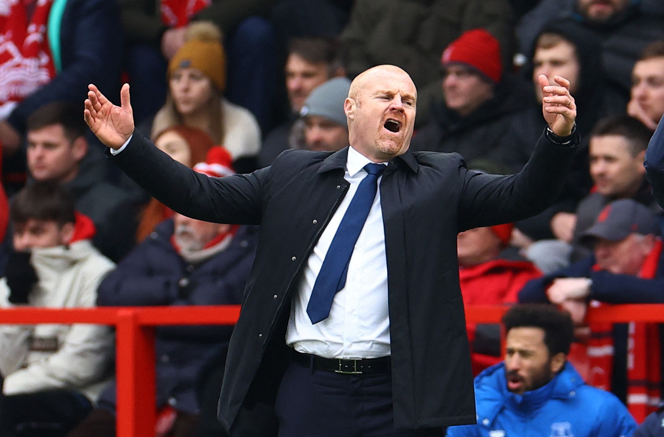Everton manager Sean Dyche with arms up in air