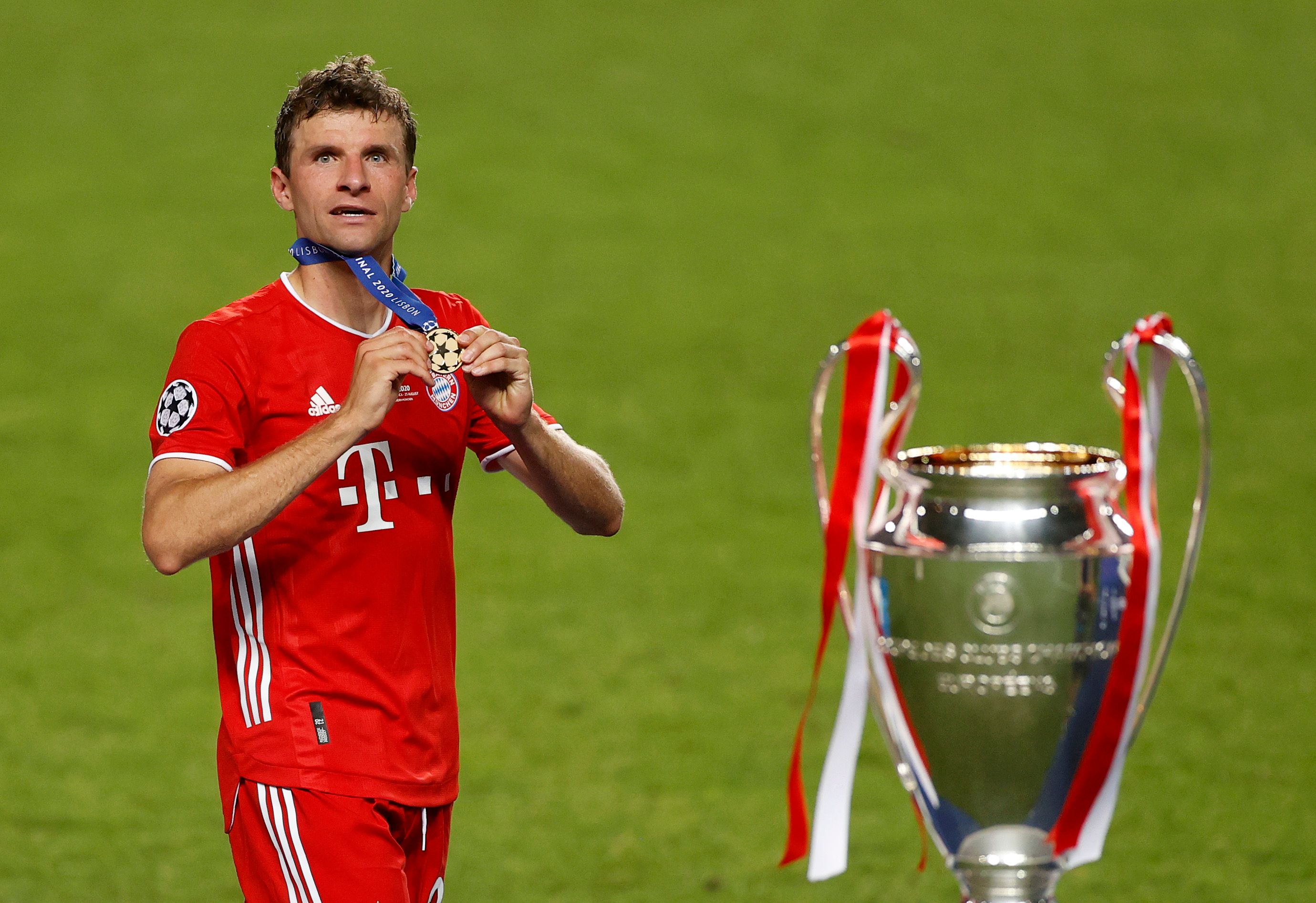 Thomas Muller of FC Bayern Munich celebrates with his winners medal following the UEFA Champions League Final match between Paris Saint-Germain and Bayern Munich at Estadio do Sport Lisboa e Benfica on August 23, 2020 in Lisbon, Portugal