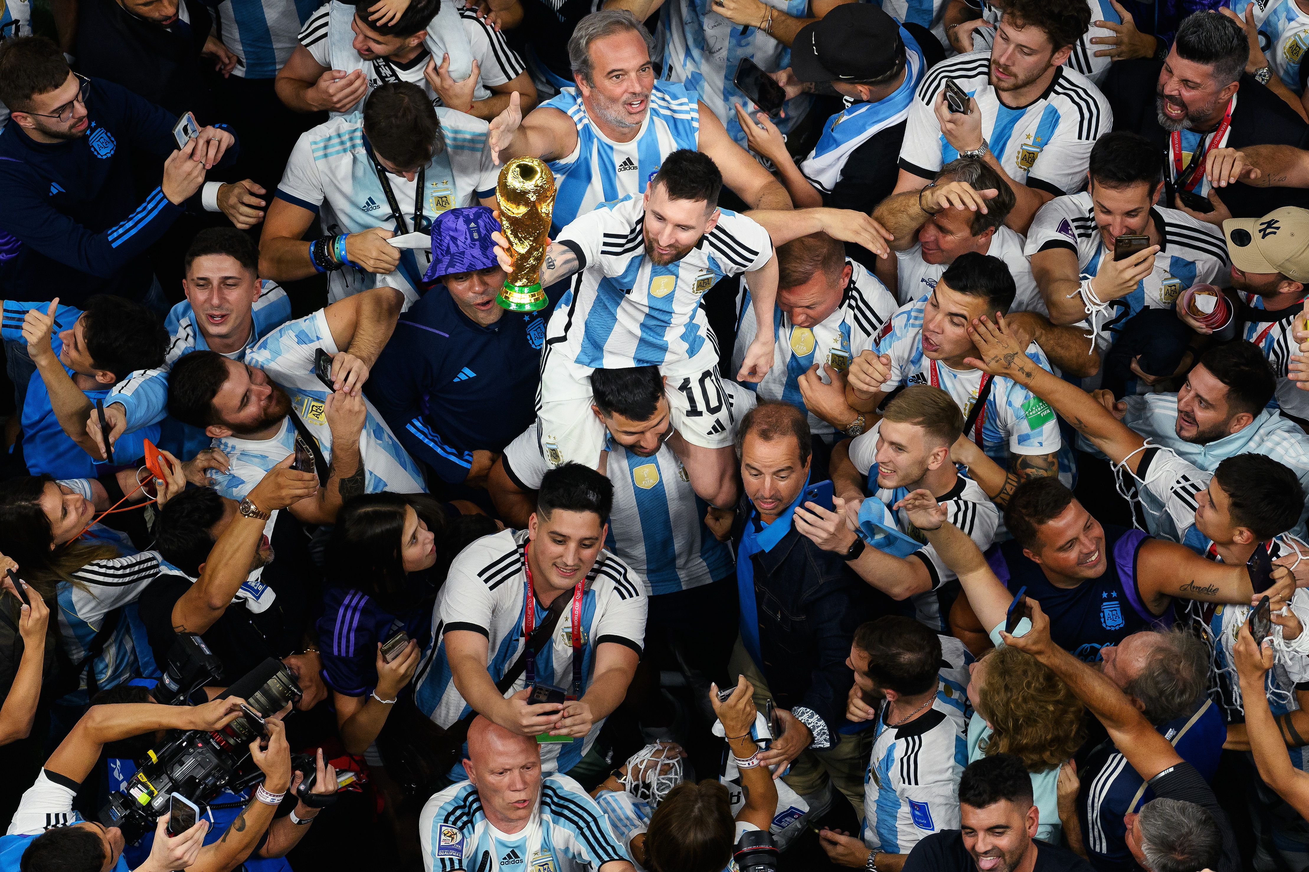 Lionel Messi lifts the World Cup.