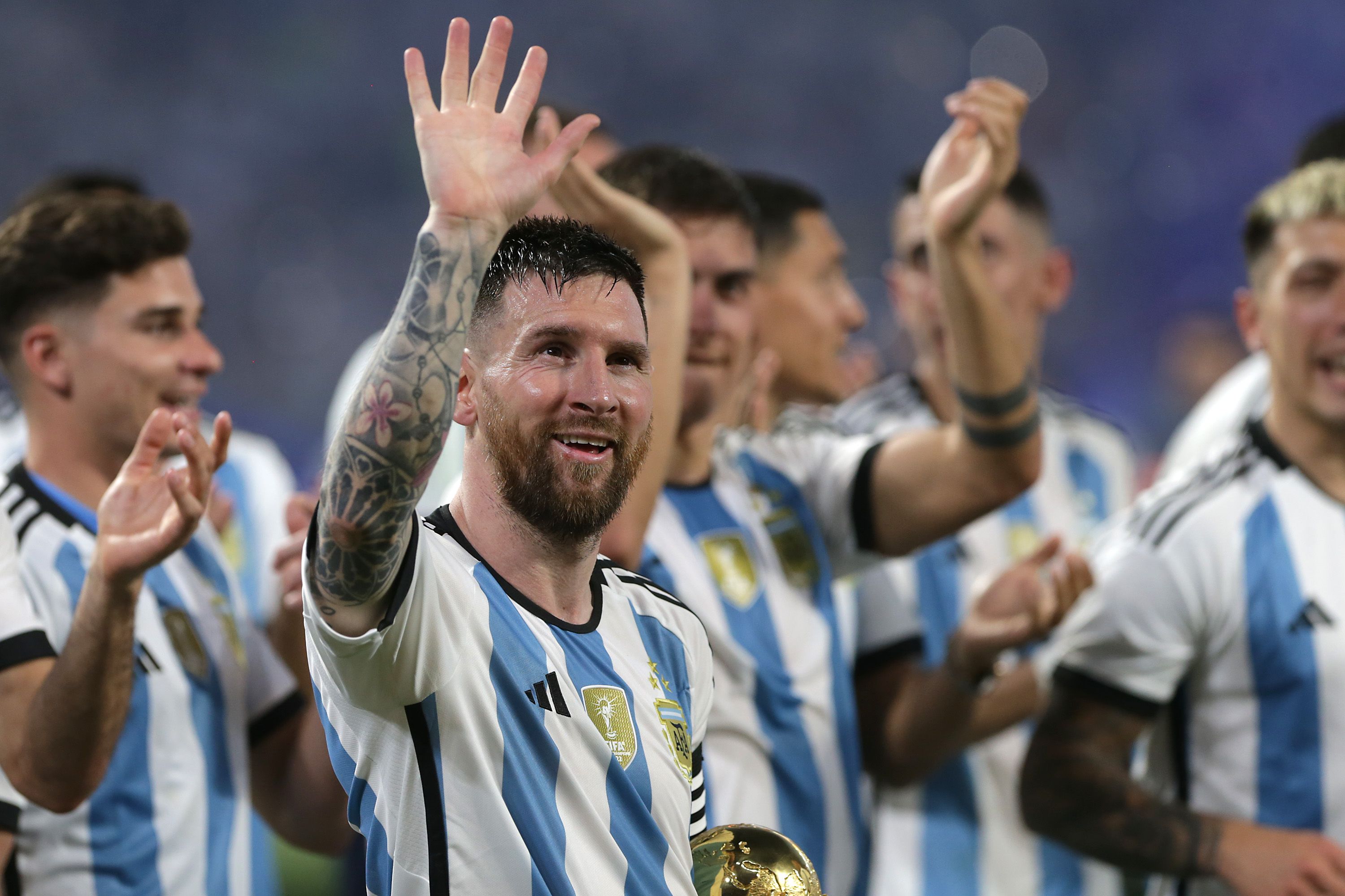 Lionel Messi of Argentina waves to fans