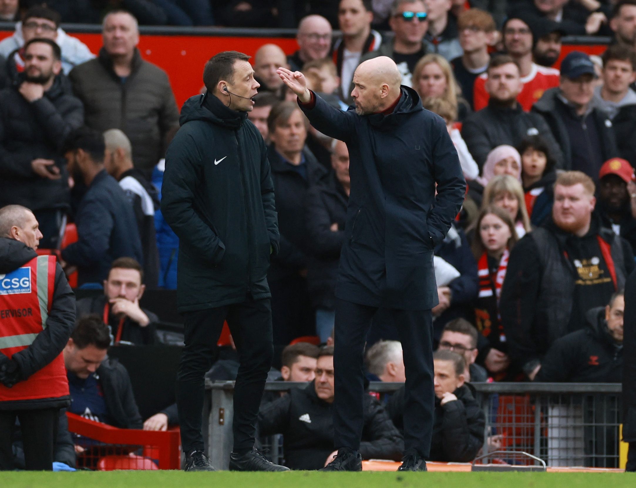 Manchester United manager Erik ten Hag remonstrates with the fourth official