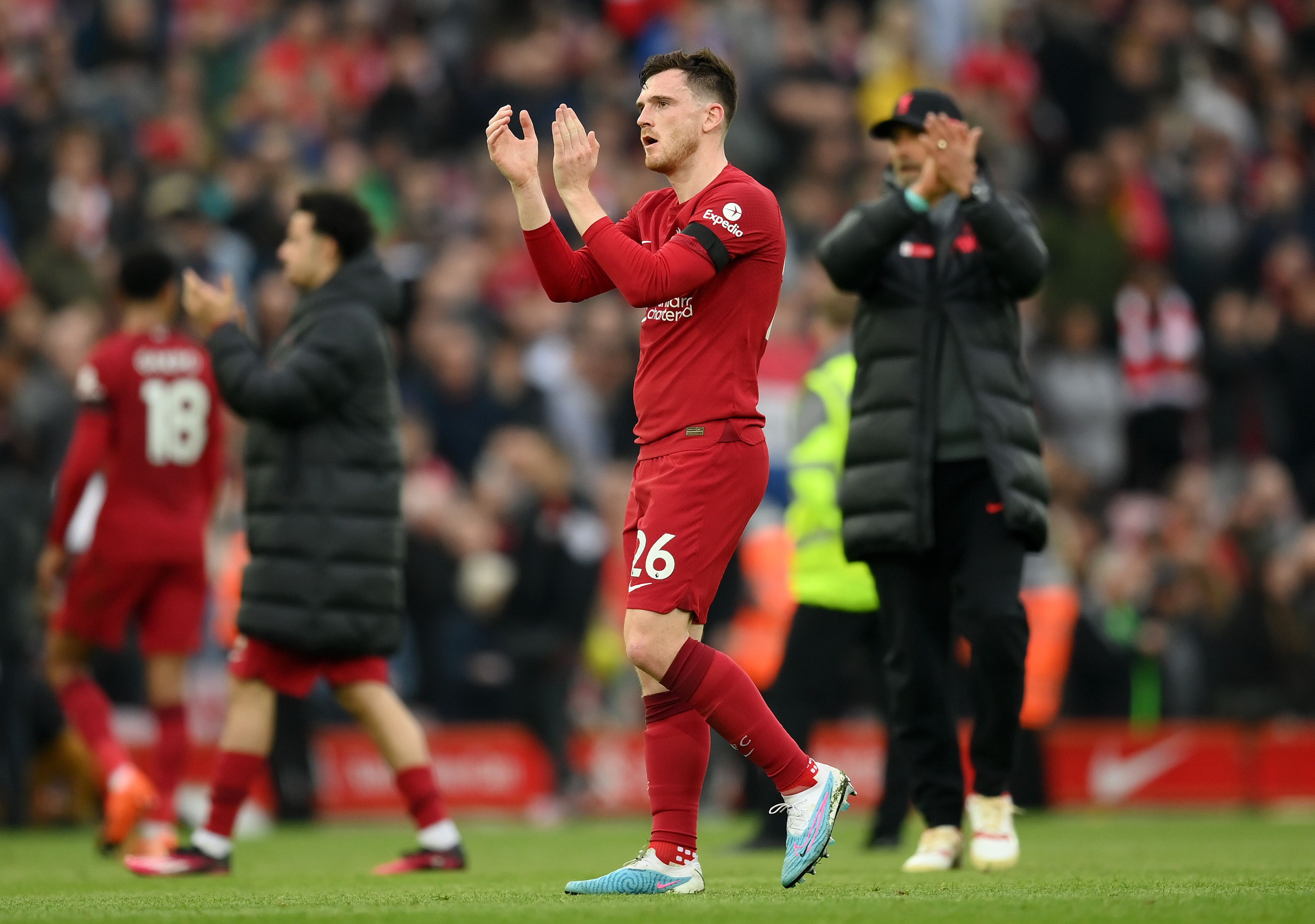 Andy Robertson claps Liverpool fans at Anfield