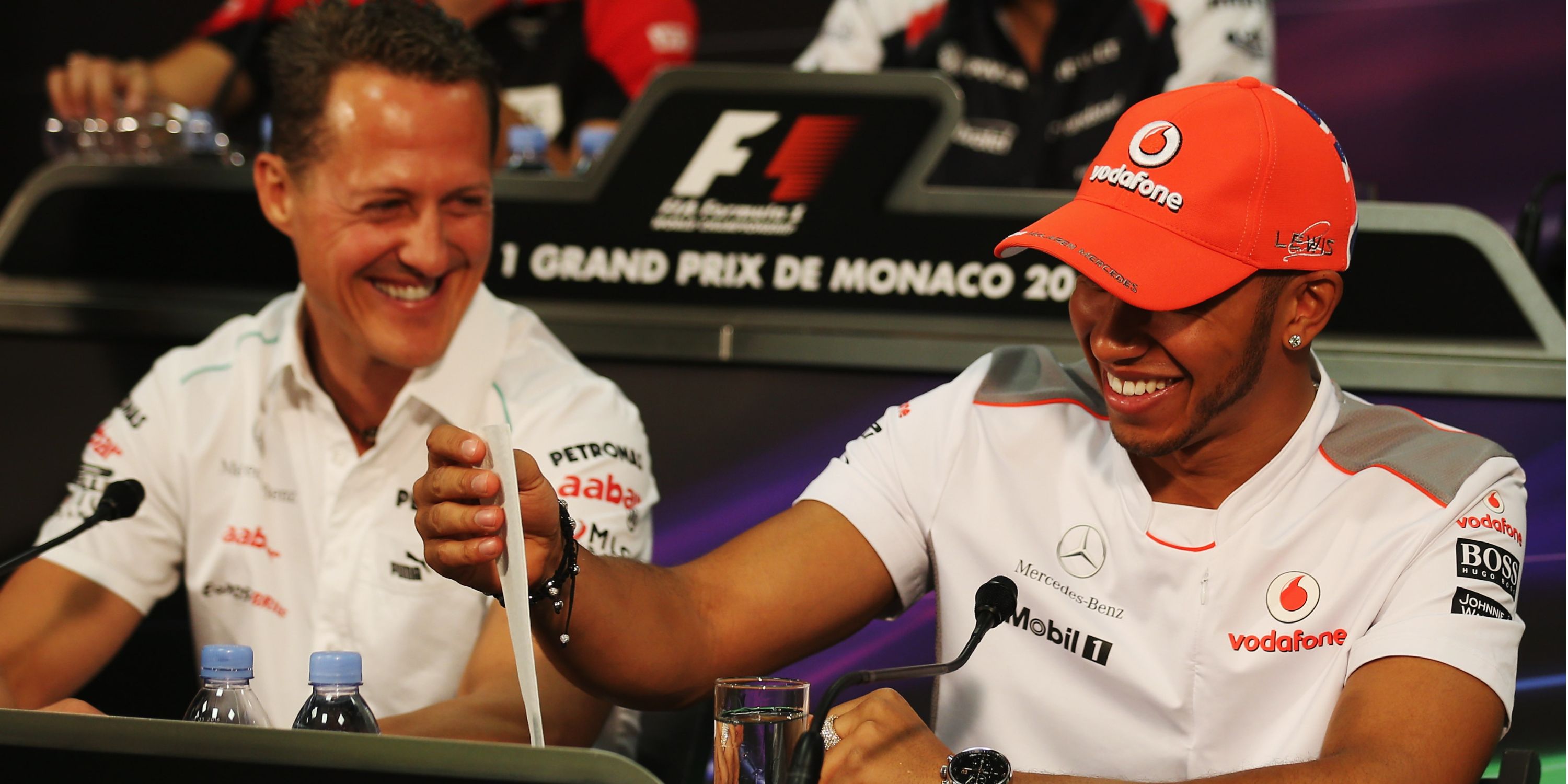 Lewis Hamilton and Michael Schumacher in a press conference