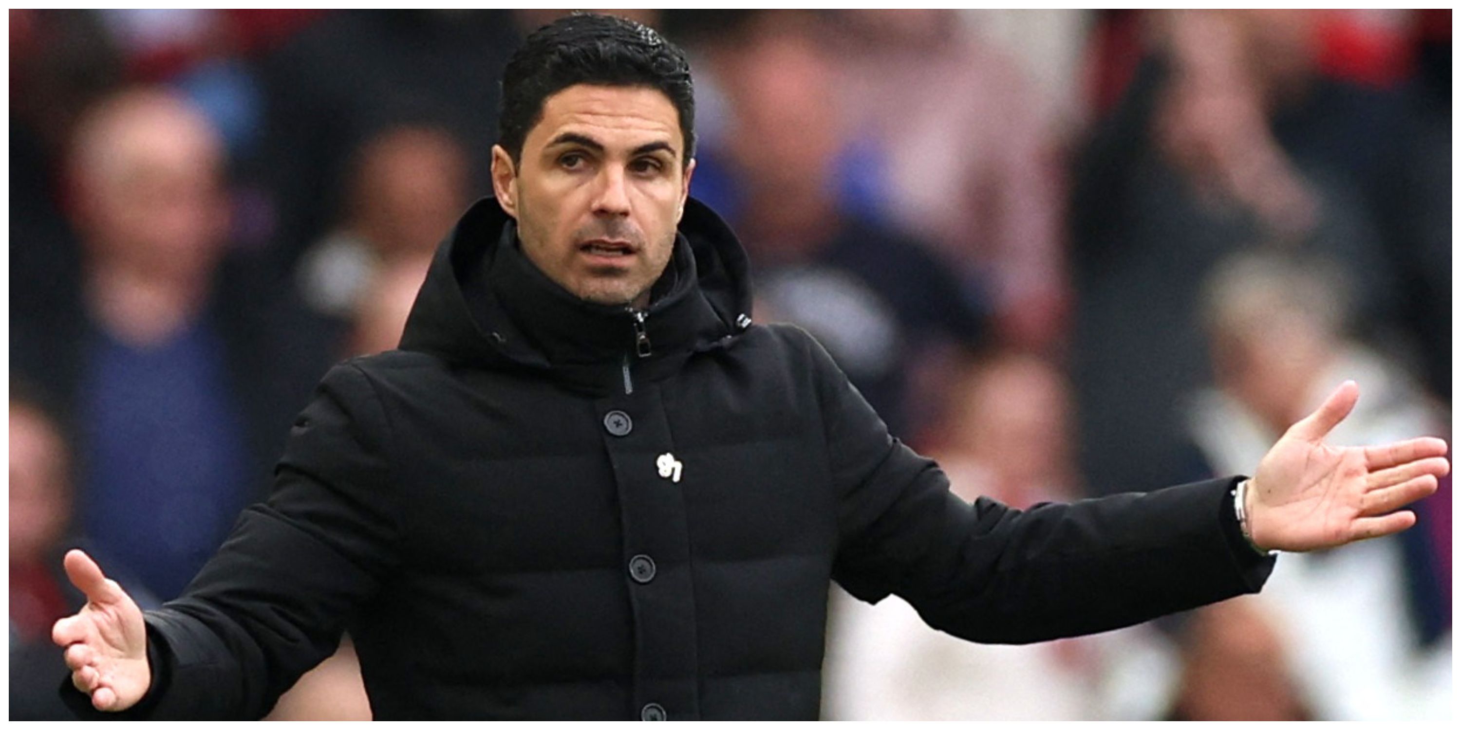 Arsenal manager Mikel Arteta with arms up