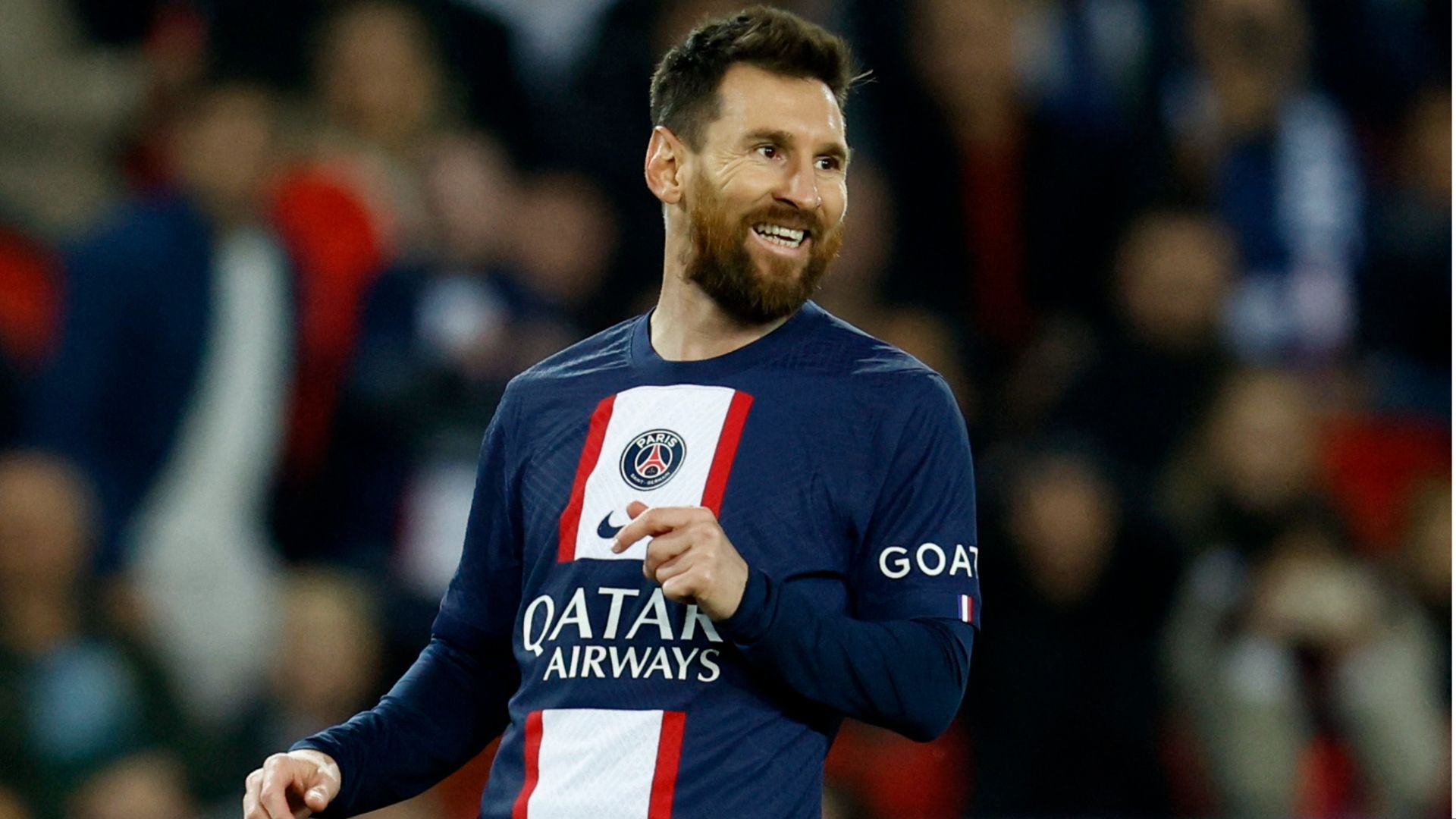 Lionel Messi of PSG smiles
