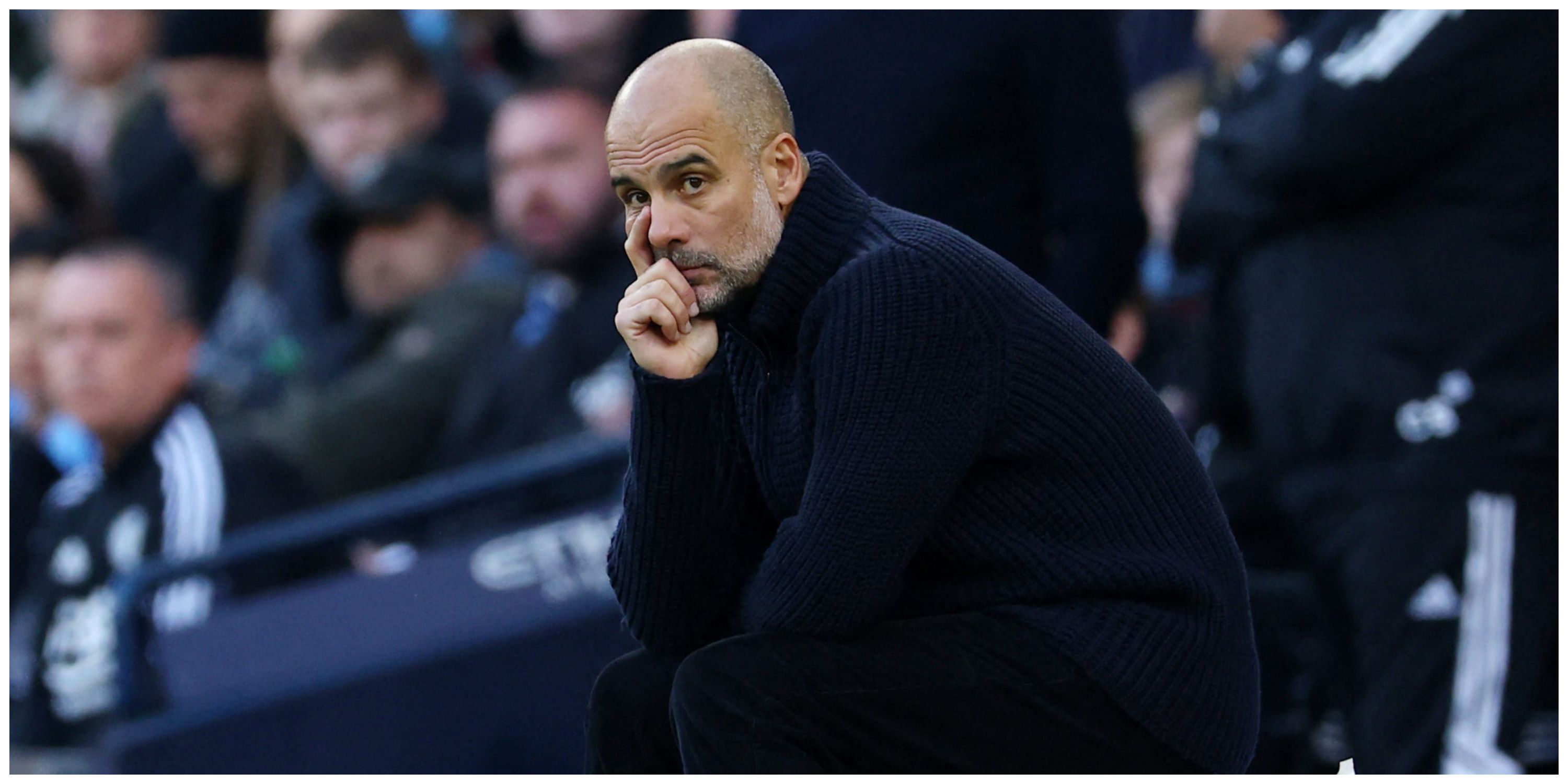 Manchester City manager Pep Guardiola concentrating on match