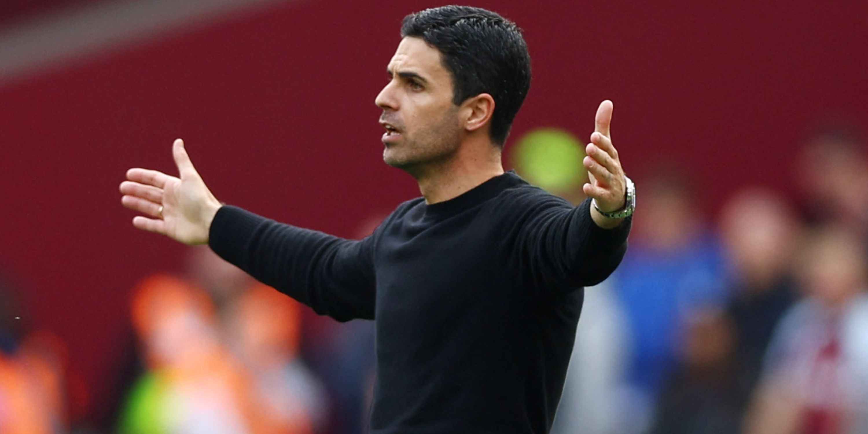 Arsenal manager Mikel Arteta with arms in the air