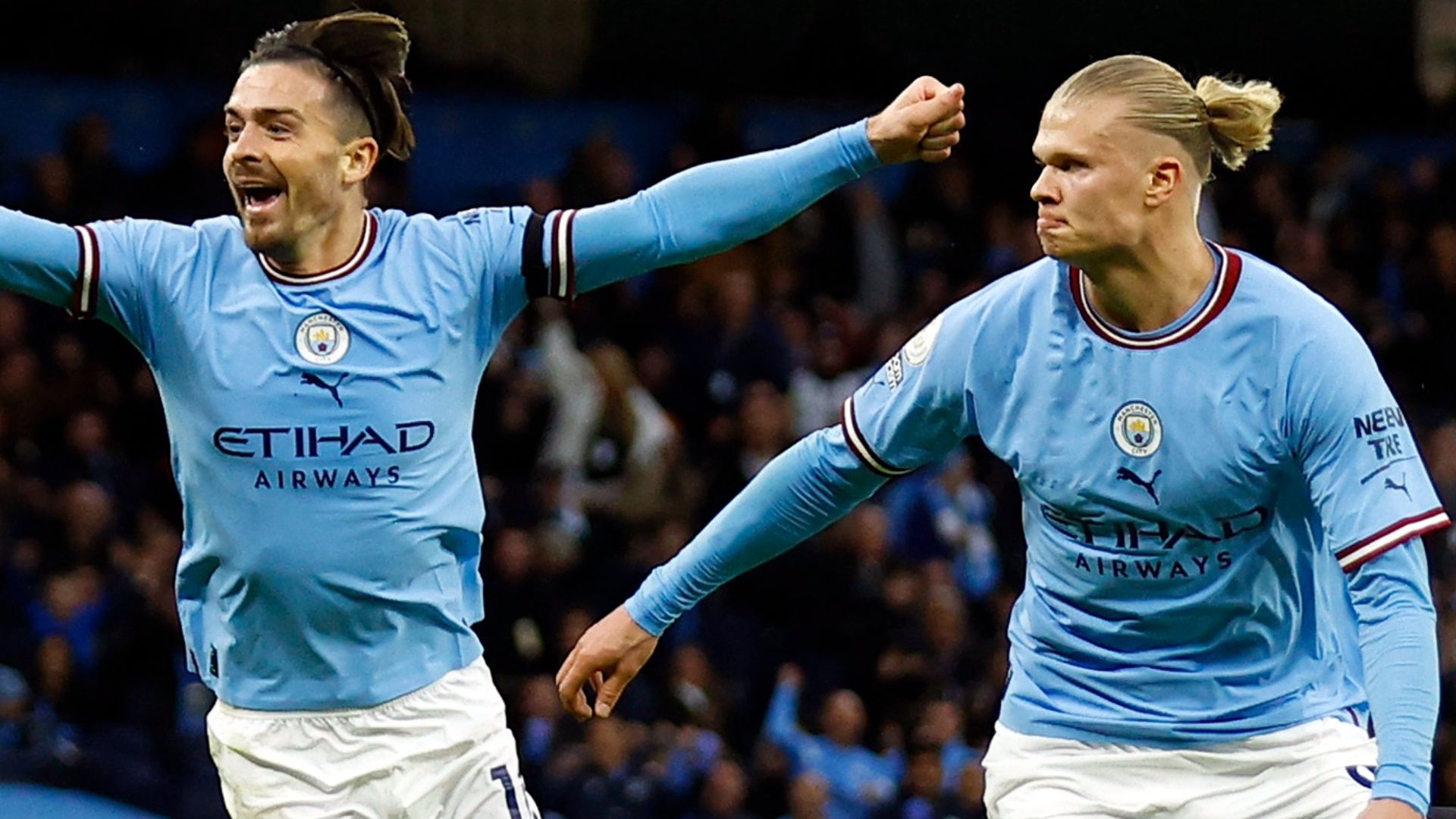 Jack Grealish and Erling Haaland celebrate a Manchester City goal