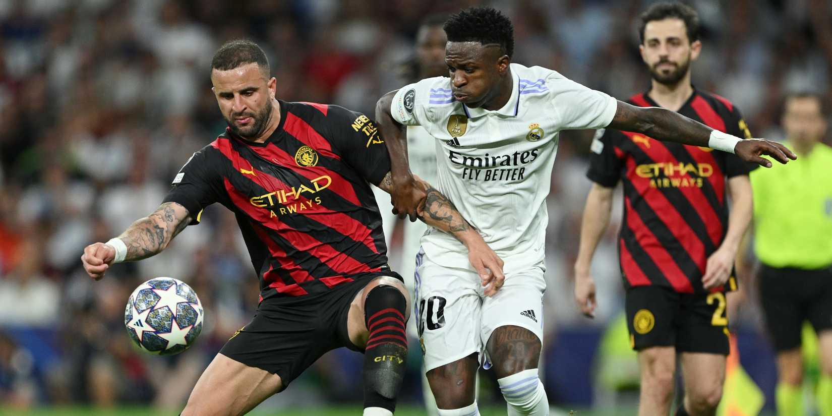 Vinicius Junior and Kyle Walker during Real Madrid 1-1 Man City.