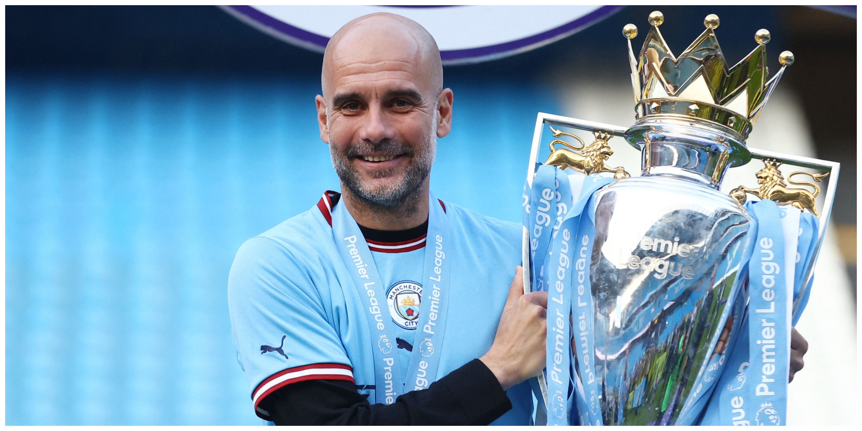 Manchester City manager Pep Guardiola holding Premier League trophy